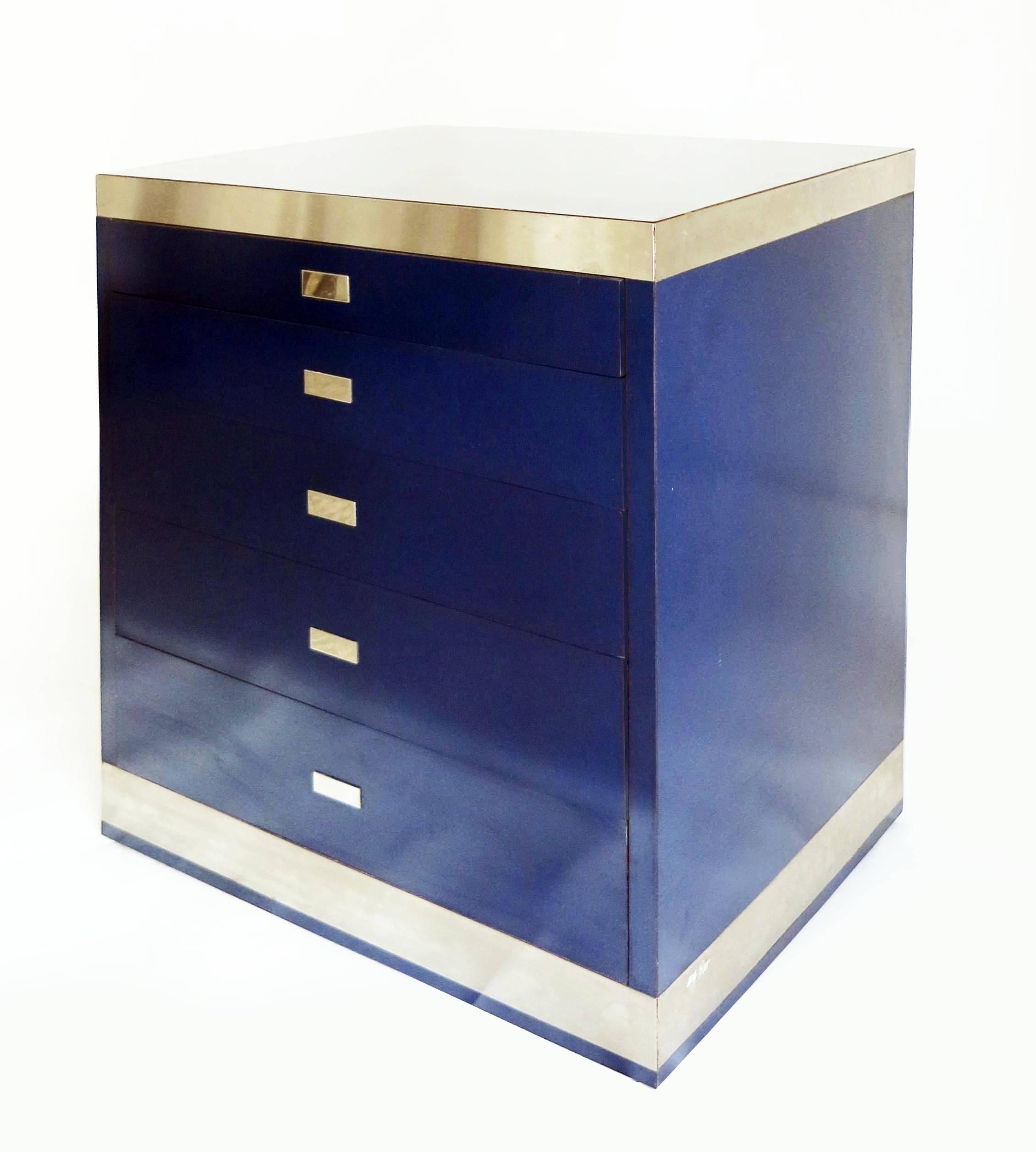 Chest of drawers by Willy Rizzo from the 1970s.
Very geometrical piece, made with beautiful dark blue laminated wood and inlaid brushed stainless steel strips.
Signed.