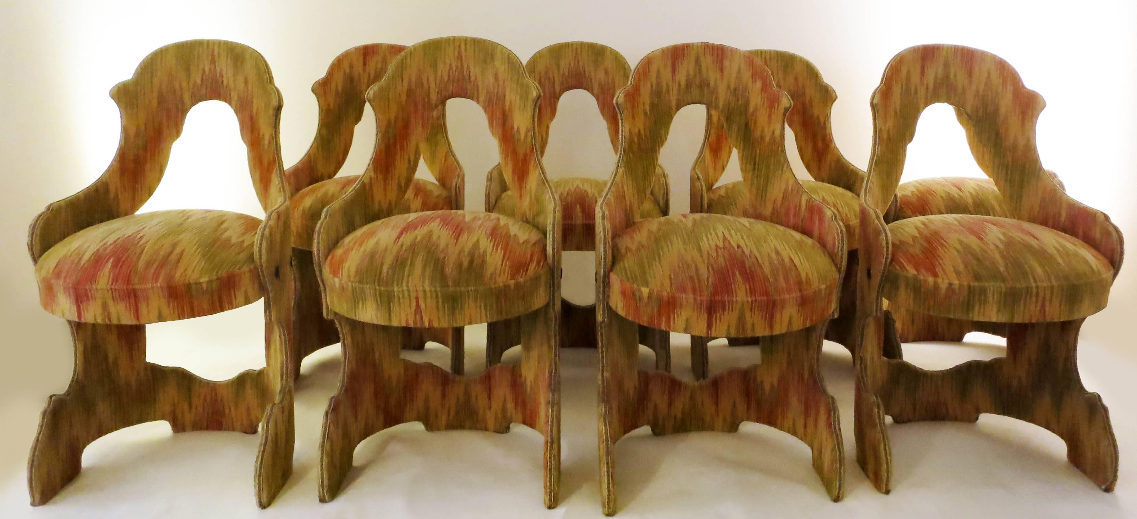Amazing venitian dining chairs from the 1960s.
Set of eight.
Wood entirely covered with velvet.
Original velvet in very good condition.