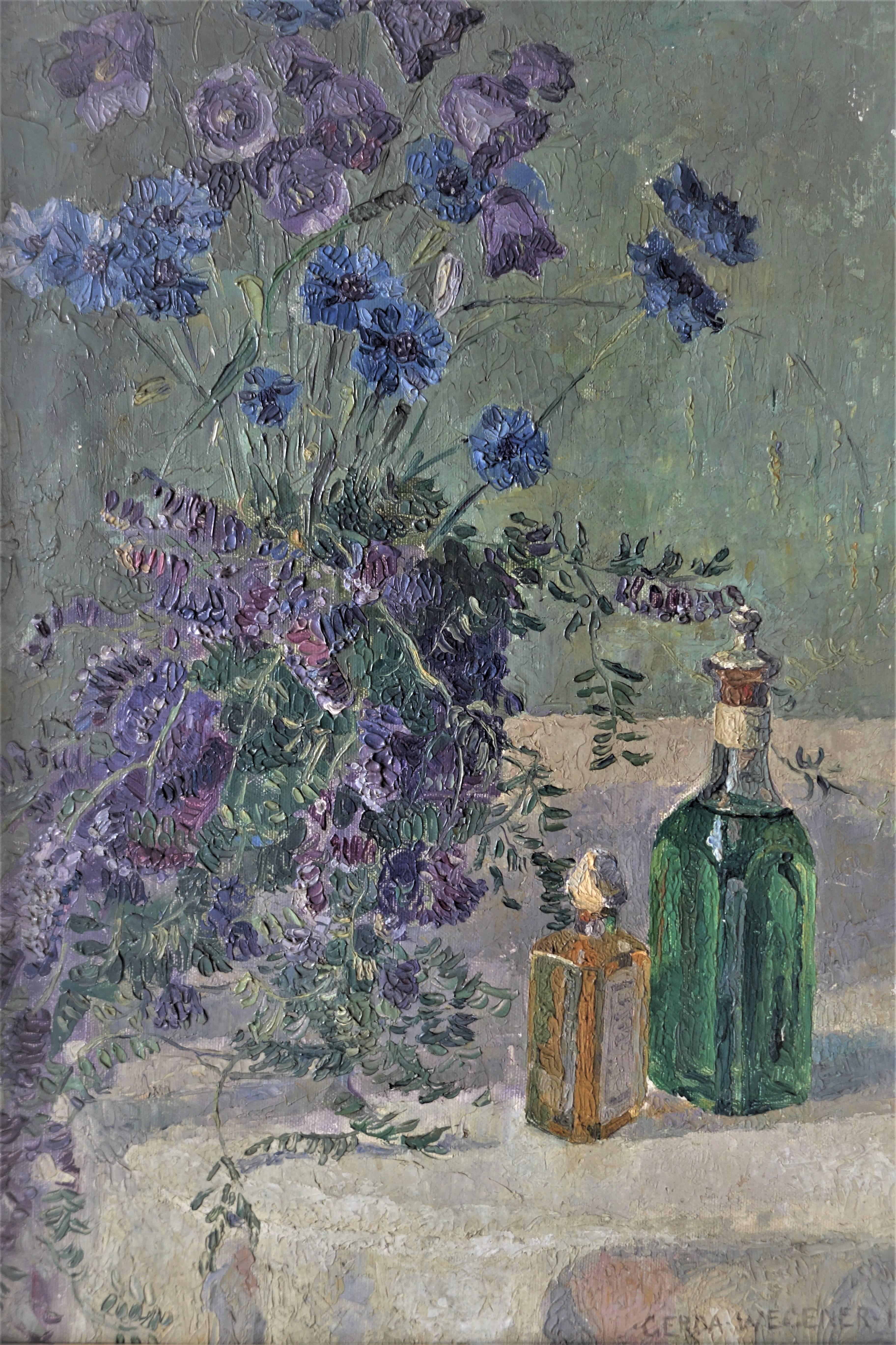 Oil on canvas of blue flowers and bottles on a table by the Danish artist Gerda Wegener (1885-1940).
Dimensions: (W x H) 53,5 x 71 cm, 21.1 x 28 in.

 