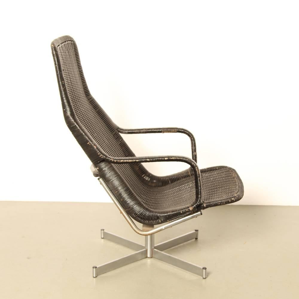 Name: 614c
designer: Dirk van Sliedregt
manufacturer: Gebroeders Jonkers, Noordwolde, the Netherlands
design year: 1961

This is the more expensive model; the 514 had fixed legs.

Knoll-style brushed steel swivel base.

High back rattan