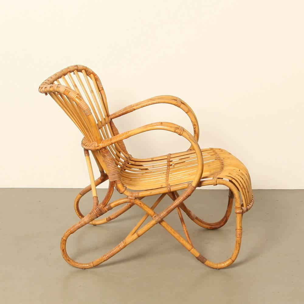 Name: RB-2
Designer: Dirk van Sliedrecht
Manufacturer: Rohe Noordwolde, the Netherlands
Design year: 1950s

Beautifully streamlined 1950s rattan and cane armchair in perfect condition, especially given its age.