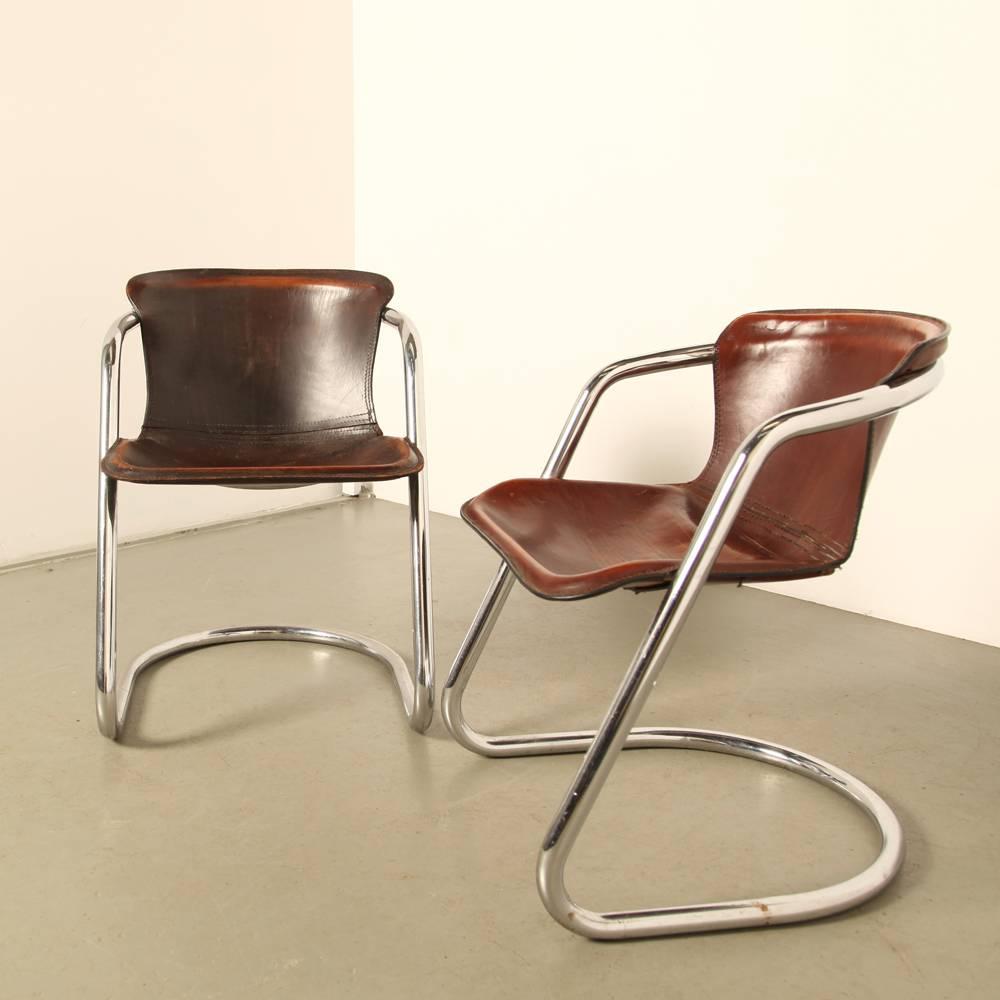Name: dining-room chair
Designer: Willy Rizzo
Manufacturer: Cidue, Italy
Design year: circa 1975


Saddle leather seat with tubular chrome frame

Dimensions “man”: 58 D x 54 W x 74 H cm
Seat height: 46 cm

Dimensions “woman”: 56 D x 54 W x 70 H