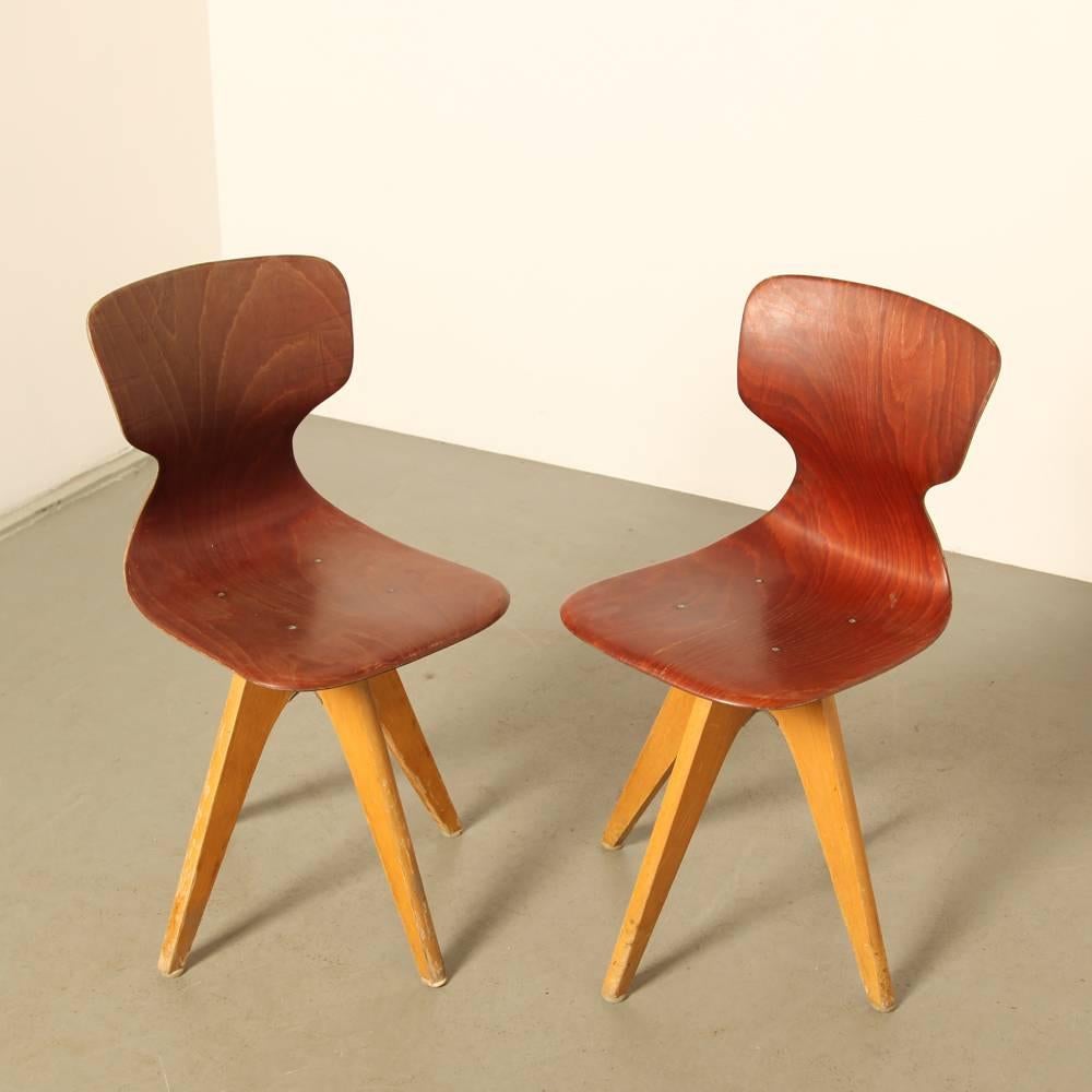 Name: School chair (Schulmöbel)
Designer: Adam Stegner
Manufacturer: Pagholz Flötotto, Germany
Design year: circa 1957

The Pagwood seat is made of two layers of wood veneer with a plastic filling that is pressed together under very high