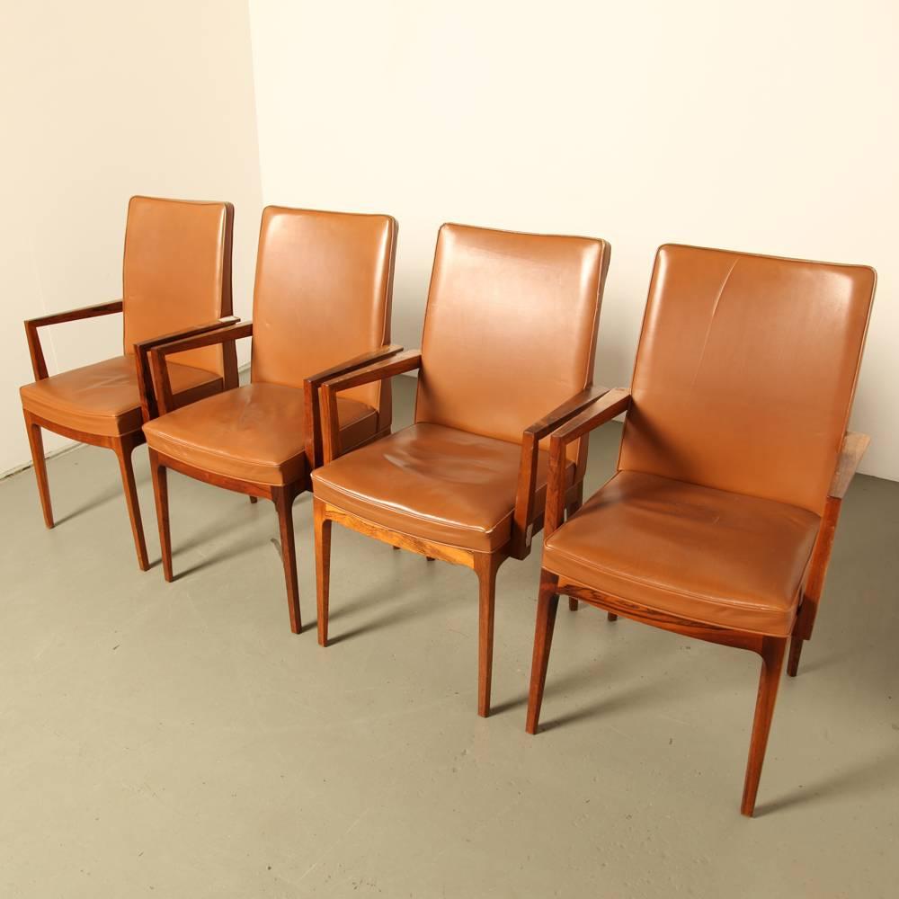 Elegant chairs from the Spanish Casala in solid rio-rosewood.

This is one set of four chairs.