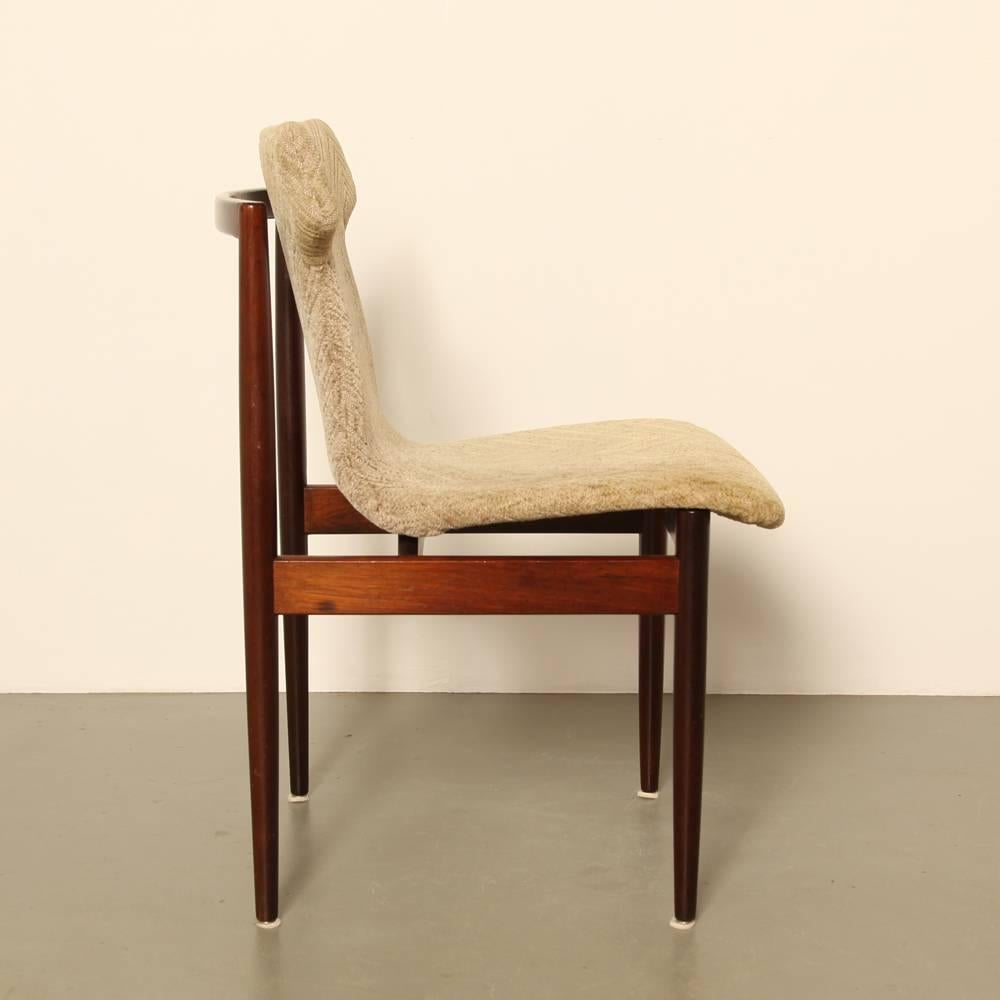 Name: Stoel IK / chair IK
Designer: Inger Klingenberg
Manufacturer: Fristho -the Friesche chair and wood wares factory, the Netherlands
Design year: 1960

Made of rosewood

with formed wooden seat (covered in foam) with freestanding back.
