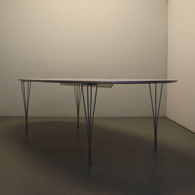 Design: Piet Hein and Bruno Mathsson

Manufacture: Republic of Fritz Hansen, Denmark 2007

Size: 240 D x 120 W x 73 H cm.
 