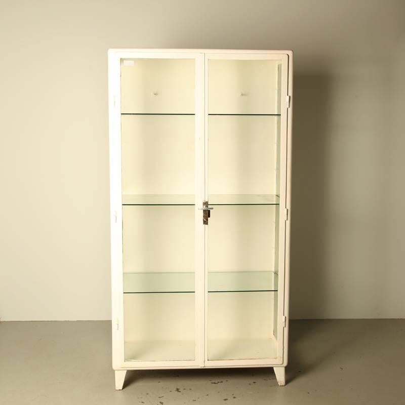 white apothecary cabinet