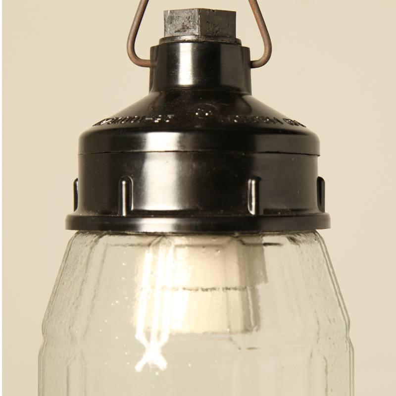 Cute little Industrial pendant from Ukraine. 
Bakelite top and glass in the form of a grenade.
E27 porcelain lampholder

All lamps have been made suitable by international standards for incandescent light bulbs, energy-efficient and LED bulbs.