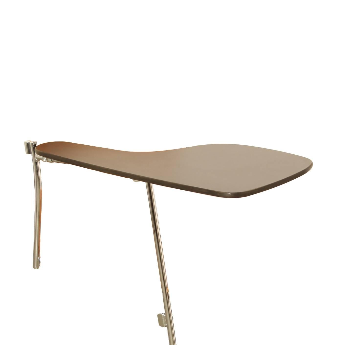 Name: 40/4 chair
Designer: David Rowland
Manufacturer: Howe, Denmark
Design year: 1964

Desk folds to rest at side of chair.