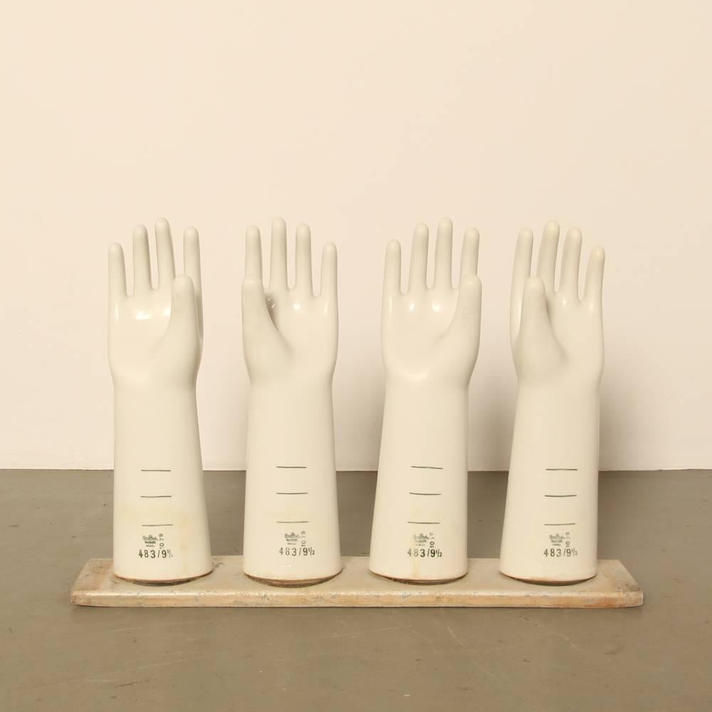 These gorgeous objects drew attention from the moment they were brought into the shop. They are molds for the making of latex gloves. Made from the best ceramics known to man at the time, they were immersed in vats of bubbling liquid latex. Some are