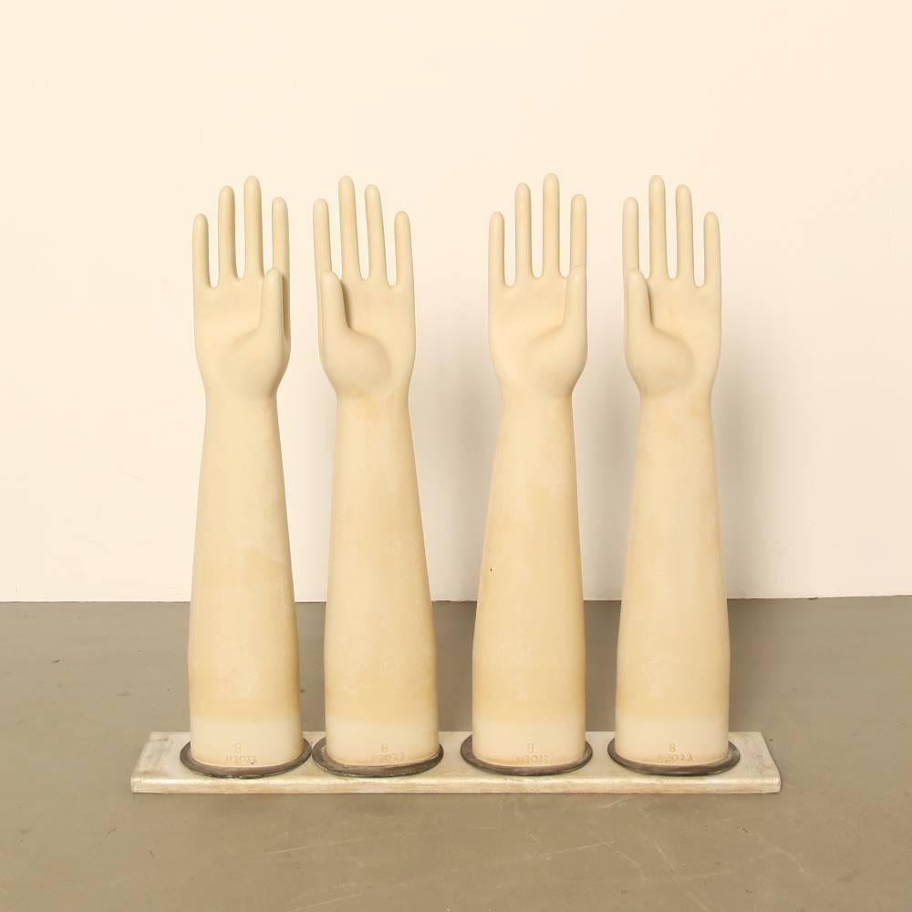 These gorgeous objects drew attention from the moment they were brought into the shop. They are molds for the making of latex gloves. Made from the best ceramics known to man at the time, they were immersed in vats of bubbling liquid latex. Some are