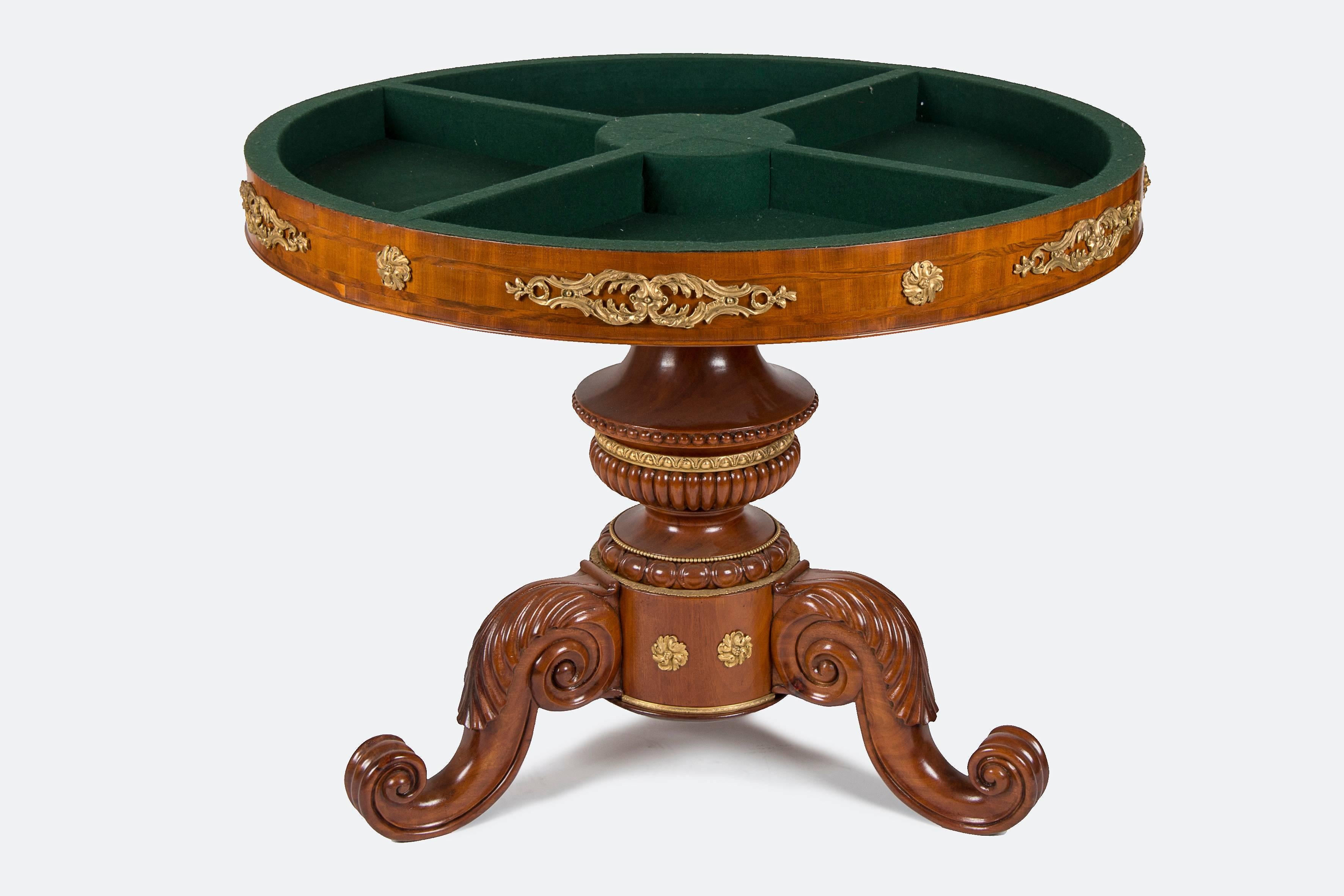 Cuban mahogany and fruitwood game table and pedestal with a reversible top, ormoulu mounted, top nicely inlaid.