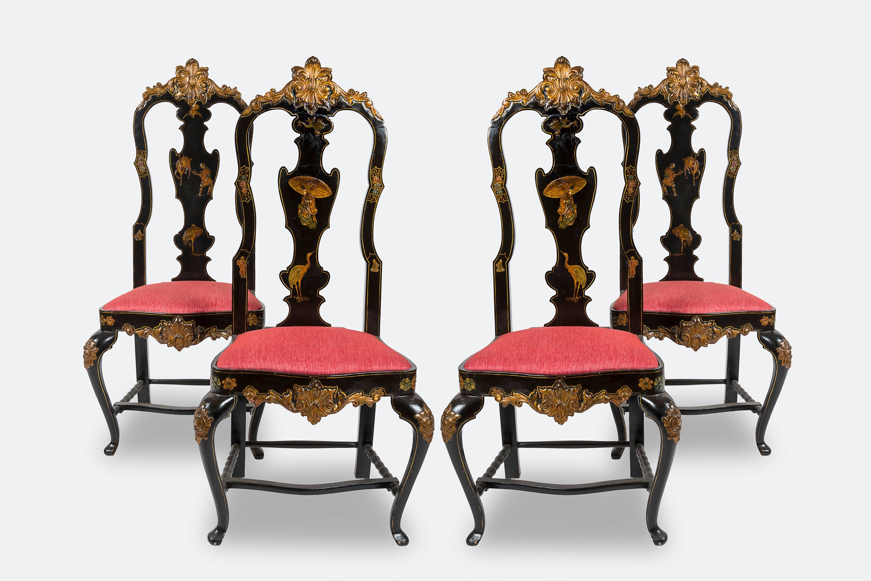 Set of four Chinese style chairs, covered with red fabric.