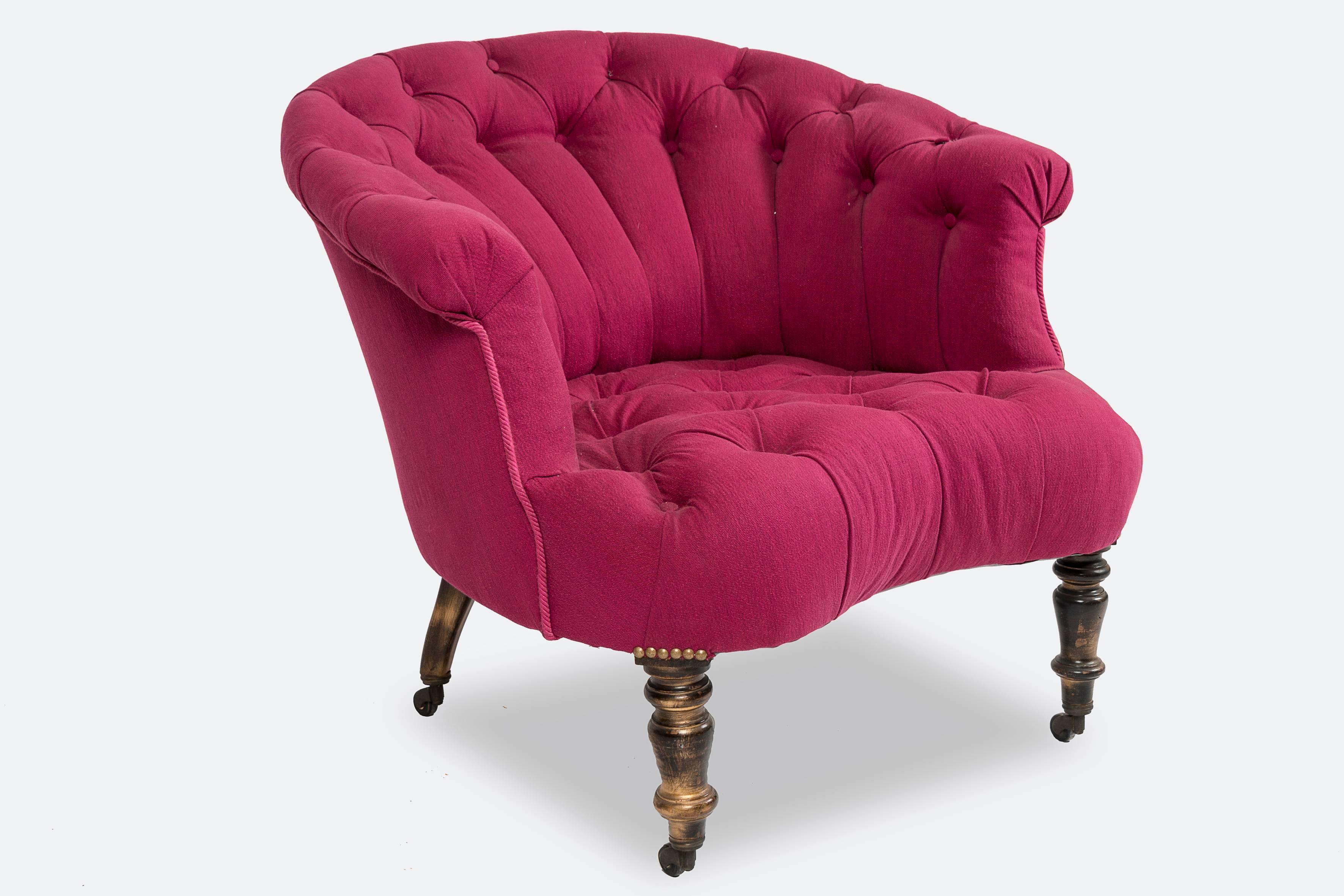 Pair of Napoleon III padded armchairs, legs ending with castors, fuschia colored fabric, padded style.