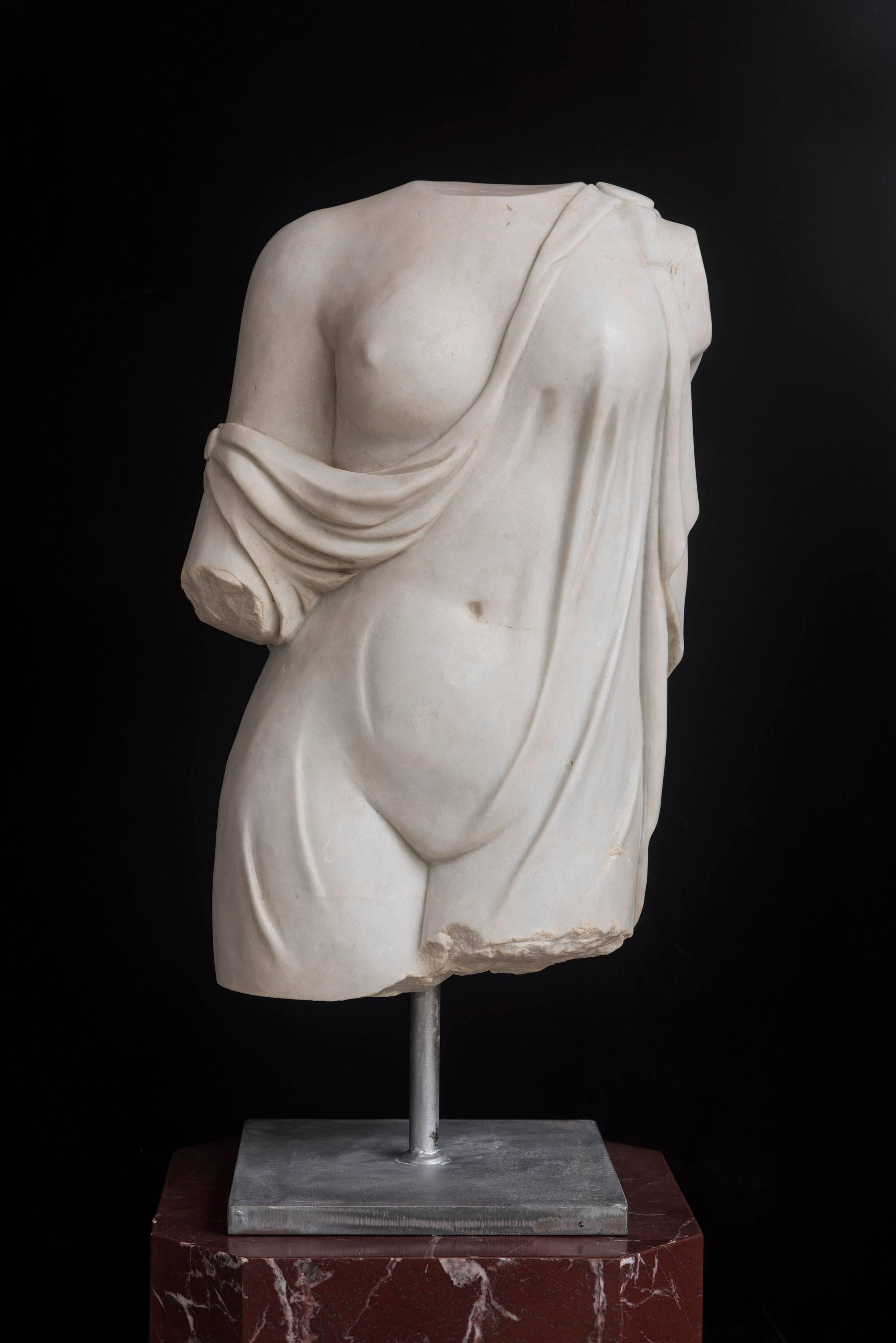 This superb torso of woman is carved by hand from the marble block following the traditional technique of Compasso. It celebrate the role of the woman during the ancient Roma age, in fact as a matriarchal culture it was very important and was the