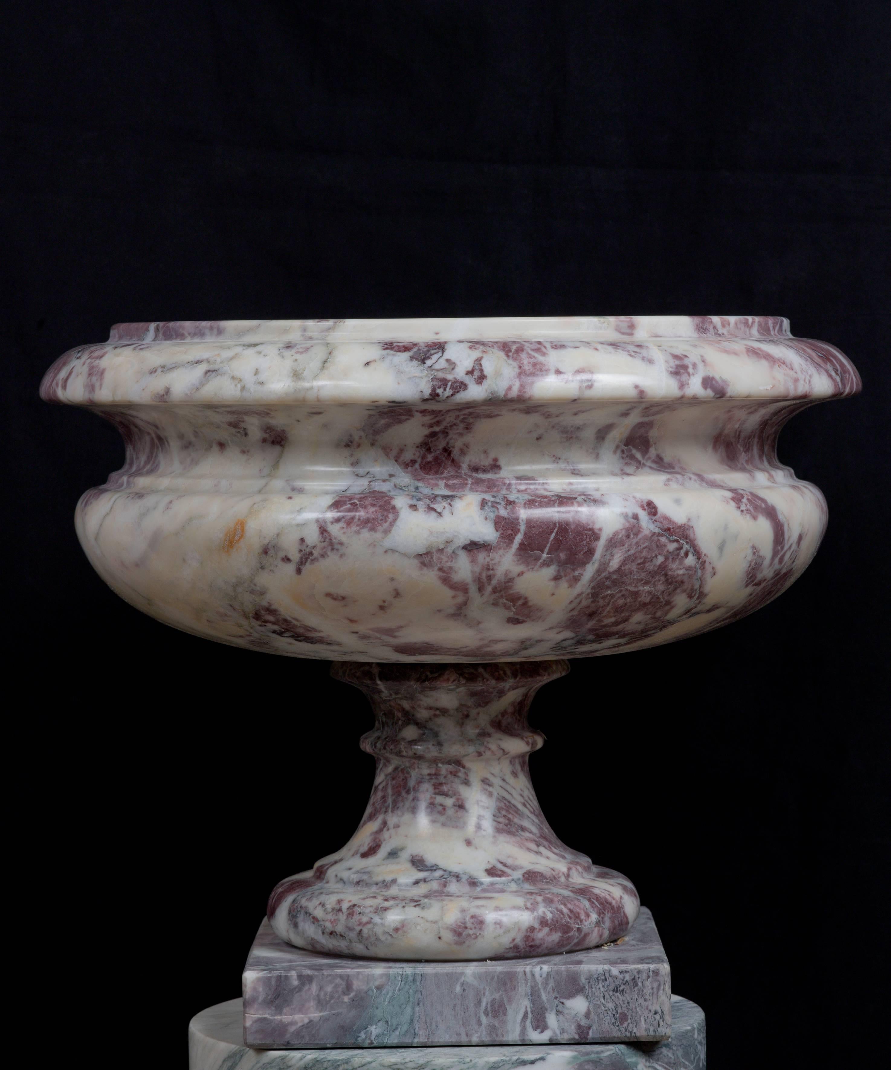 A superb pair of rare and precious breccia violetta Cachepot, in neoclassical style. This breccia that is rare and unique and is very difficult to find blocks to be carved. Any pieces made with this breccia is really unique because the veins and the