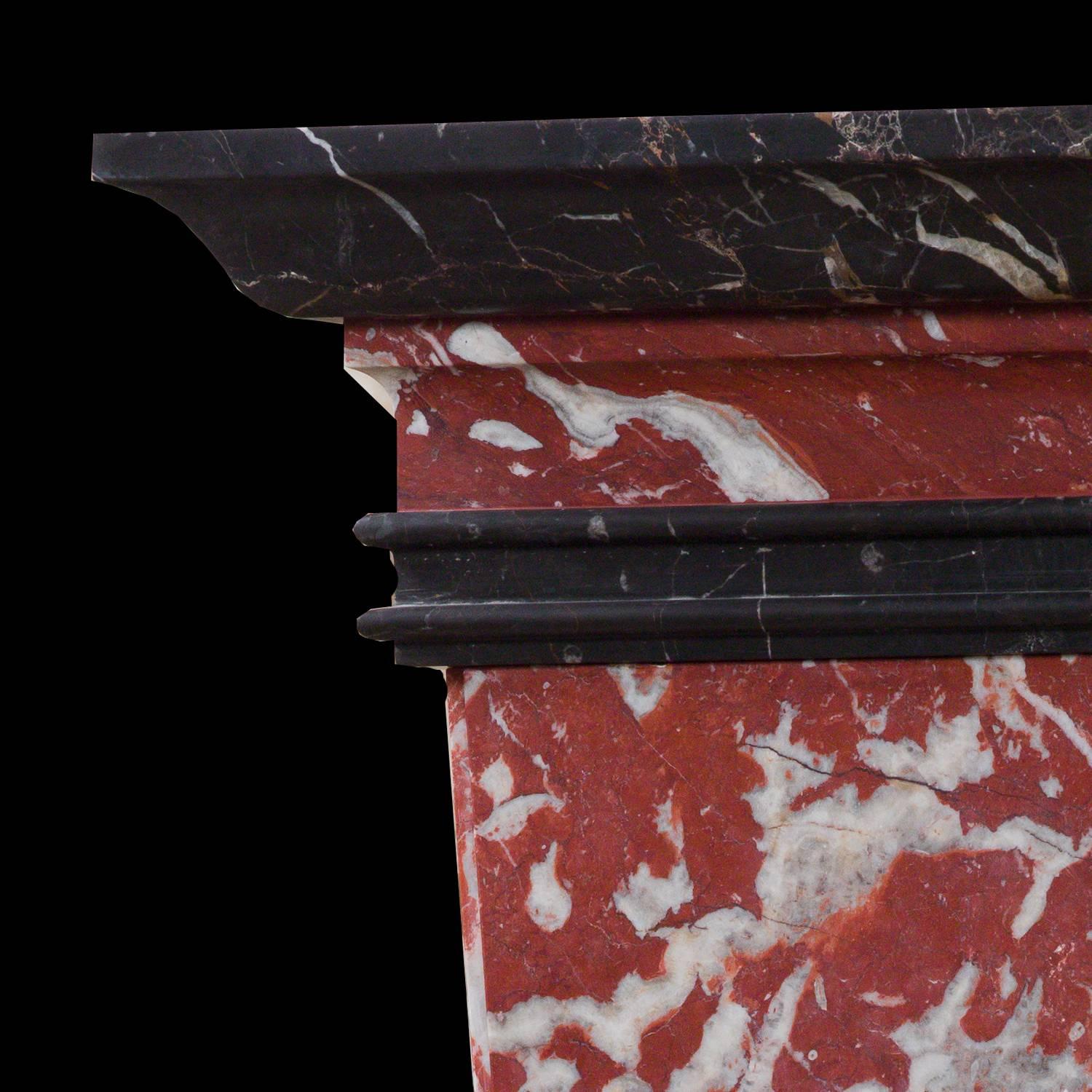 Superb pair of Herma pedestals, made in very precious French marbles: Red Languedoc and Noir St Laurent. This fancy and elegant marble were used in very high level decoration and in Europe in the most exclusive palaces and castles. Principally used