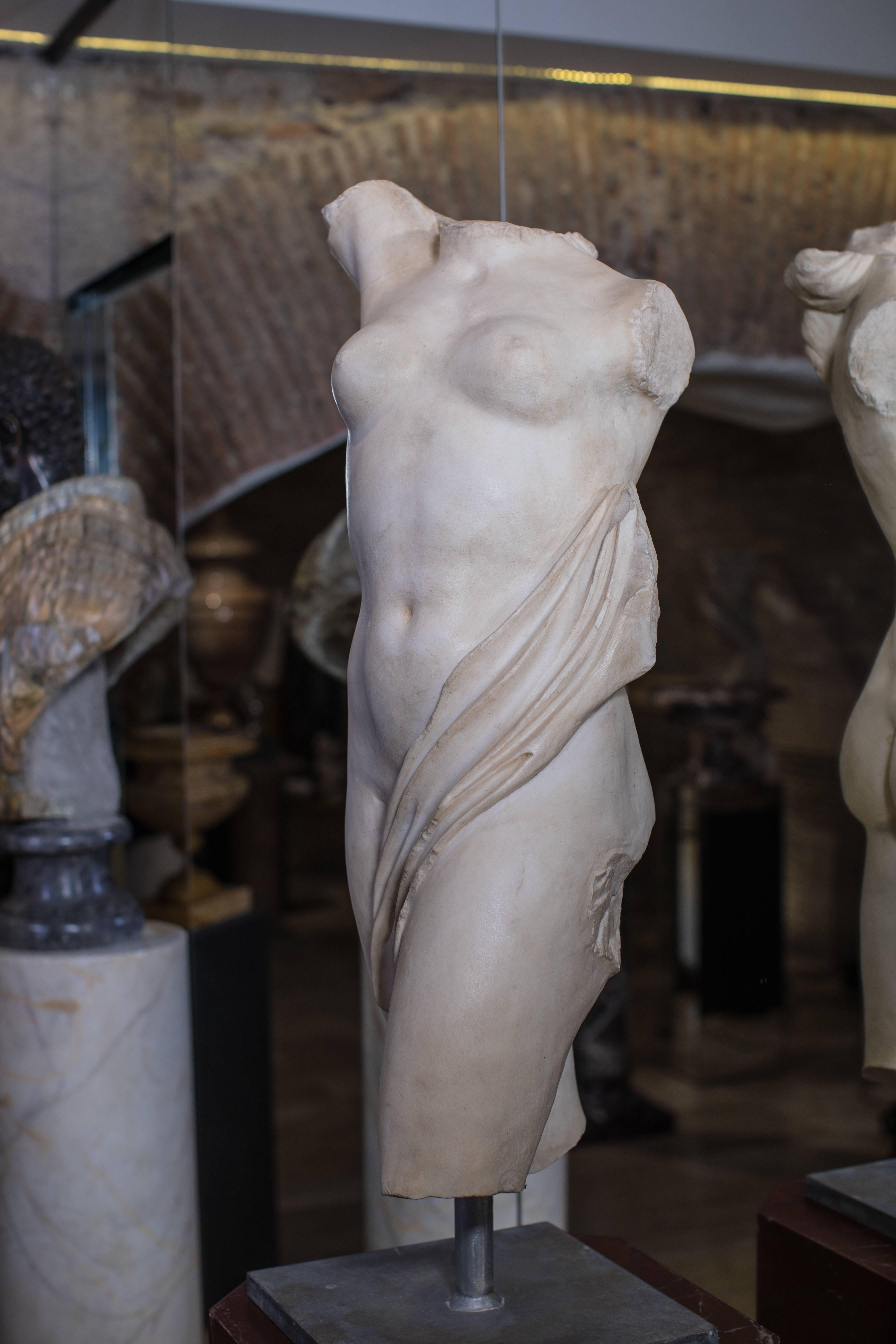 A superb torso of woman, carved in white marble and aged as after the classical roman style. The collection named once were romans, propose a selection of object and work of art focused on Classical Roman time, reclaim the heritage the taste of