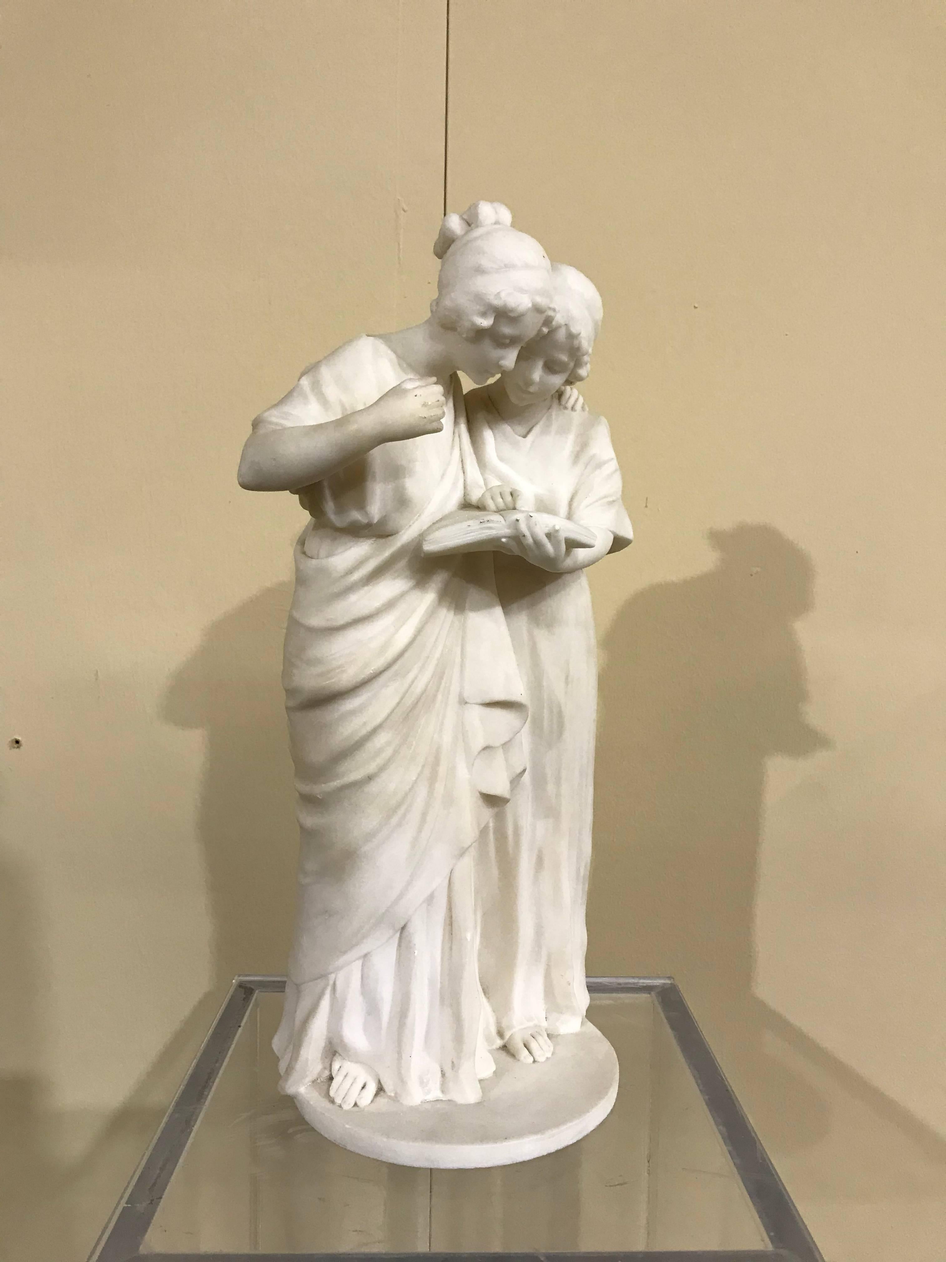 This group of Maidens portrayed in reading, is carved in Italian alabaster and is attributed to the sculptor Guglielmo Pugi, one of the most well know and active artist of that worked principally in Florence at the end of 19th century. The quality
