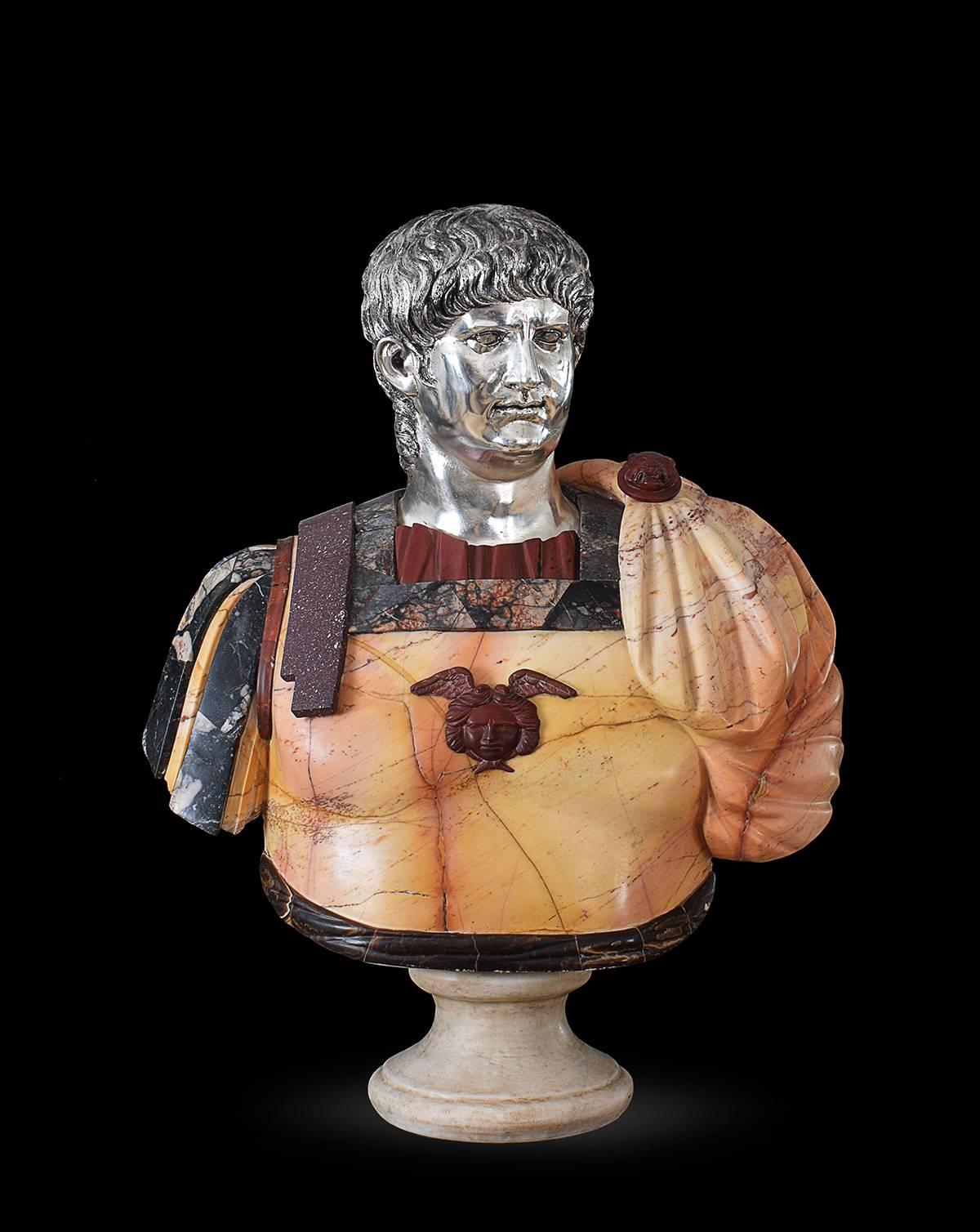 This superb bust of the Emperor Nero, is made with specimen marble and silver coated bronze for the head. About the important and rare marble for the bust, you will find the ancient yellow or also called giallo numidia, red porphyry, nero africano