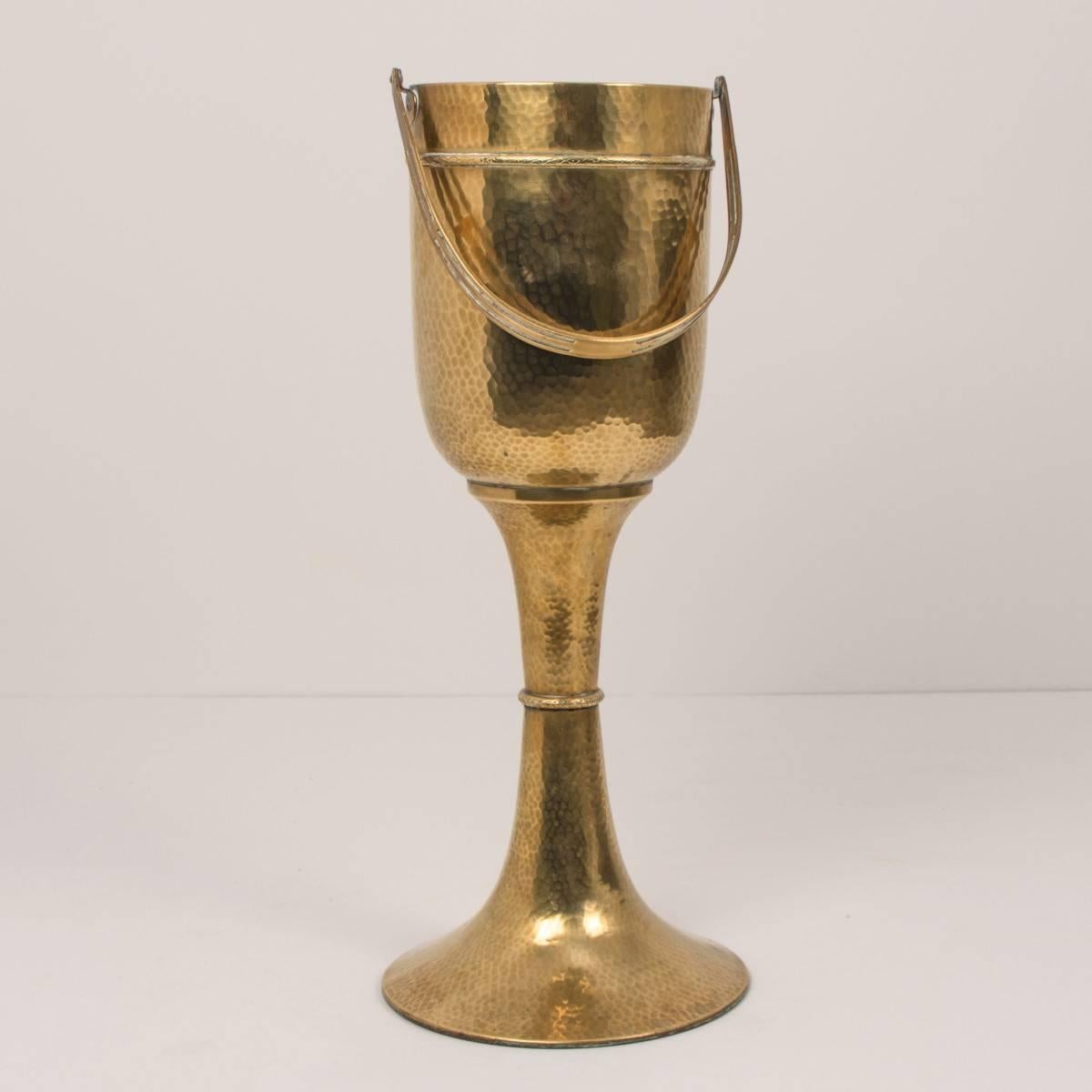 Fantastic heavy solid brass champagne cooler/ wine bottle holder with handle. Jugendstil by WMF. Polished and stove enameled
(The wine bottle is only decoration for the photo shooting, they is not included).
 