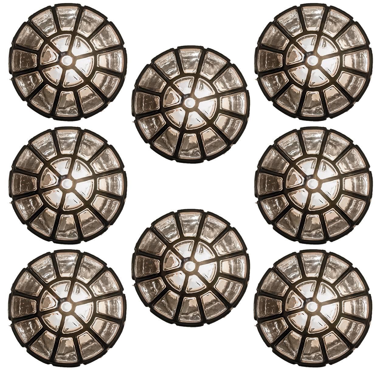 This beautiful and unique set of five octagonal glass light flush mounts or wall lights/ sconces were manufactured by Glashütte Limburg in Germany during the 1960s (late 1960s or early 1970s). Nice craftsmanship. Each lamp, made from elaborate clear
