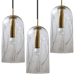 One of twoTextured Glass Pendant Lamps by Doria, 1960