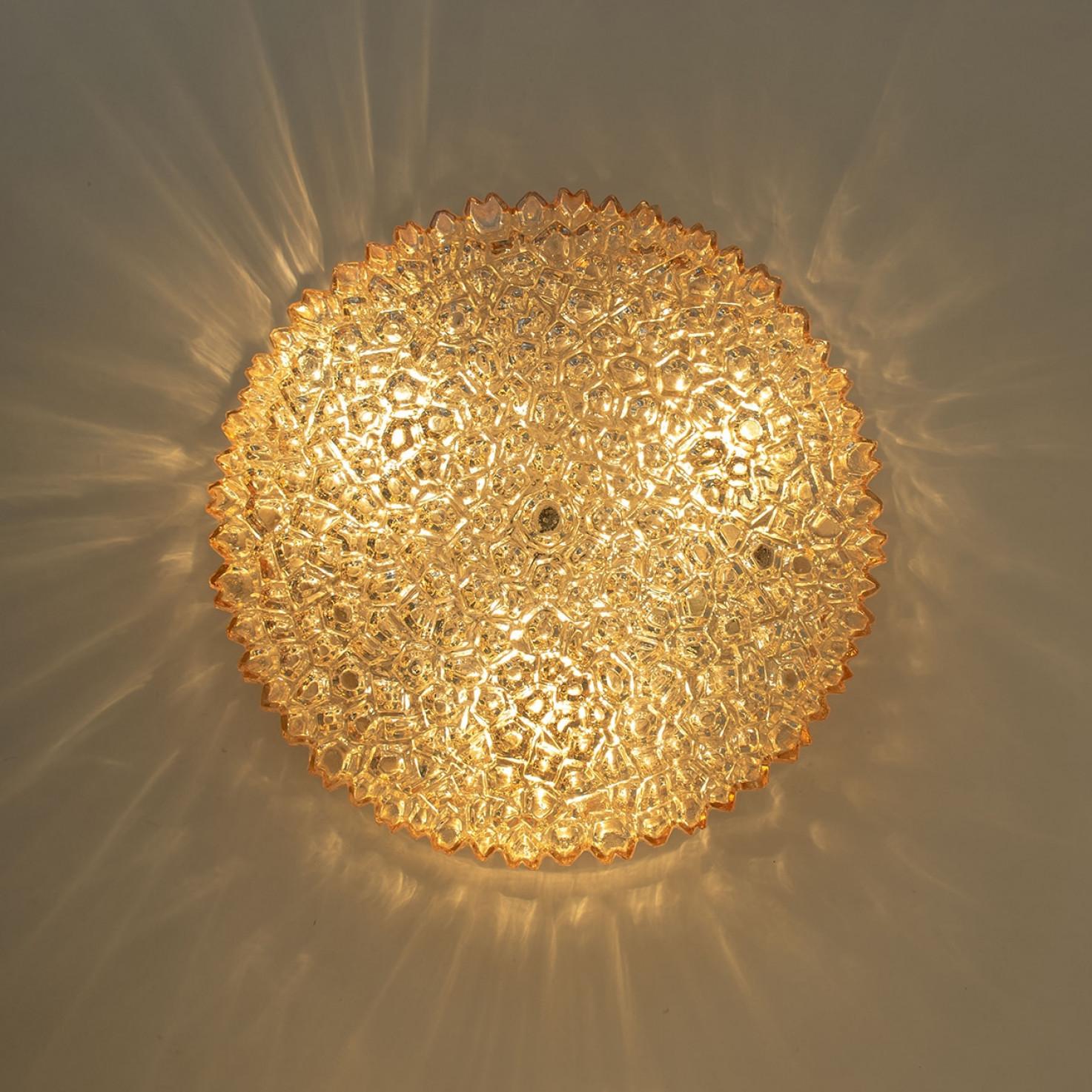 Several Round Amber Textured Glass Wall Lights Flush Mounts, Limburg, 1970 In Good Condition For Sale In Rijssen, NL