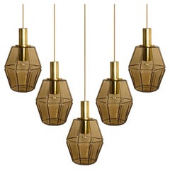 Several Geometric Brass and Glass Pendant Lights by Limburg, 1970s