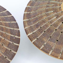 1 of the 2 Ceramic Round Wall Lights Holes in the style of Axella, Denmark 1970