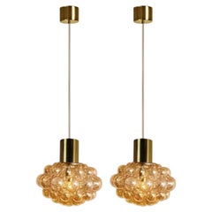 1 of the 2 Bubbled Glass and Brass Pendants by Helena Tynell, Germany 1970