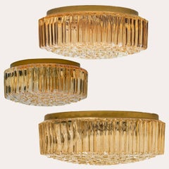 Several Round Amber Textured Glass Wall Lights Flush Mounts, Limburg, 1970