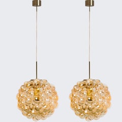 1 of the 2 Large Bubbled Glass and Brass Pendants by Helena Tynell, Germany 1970