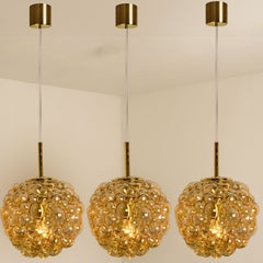 1 of the 3 Bubbled Glass and Brass Pendants by Helena Tynell, Germany 1970