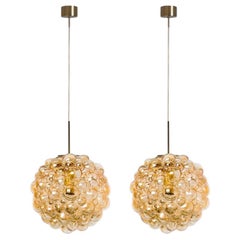 1 of the 2 Large Bubbled Glass and Brass Pendants by Helena Tynell, Germany 1970