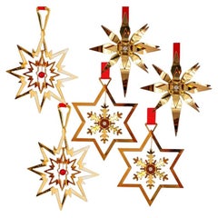 Lot de six décorations de Noël en forme d'étoile plaquées or 18 carats, signées Georg Jensen, Danemark