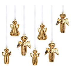 Conjunto de siete angelitos chapados en oro de 18 quilates de Georg Jensen, de diferentes años
