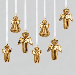 Conjunto de siete angelitos chapados en oro de 18 quilates de Georg Jensen, de diferentes años