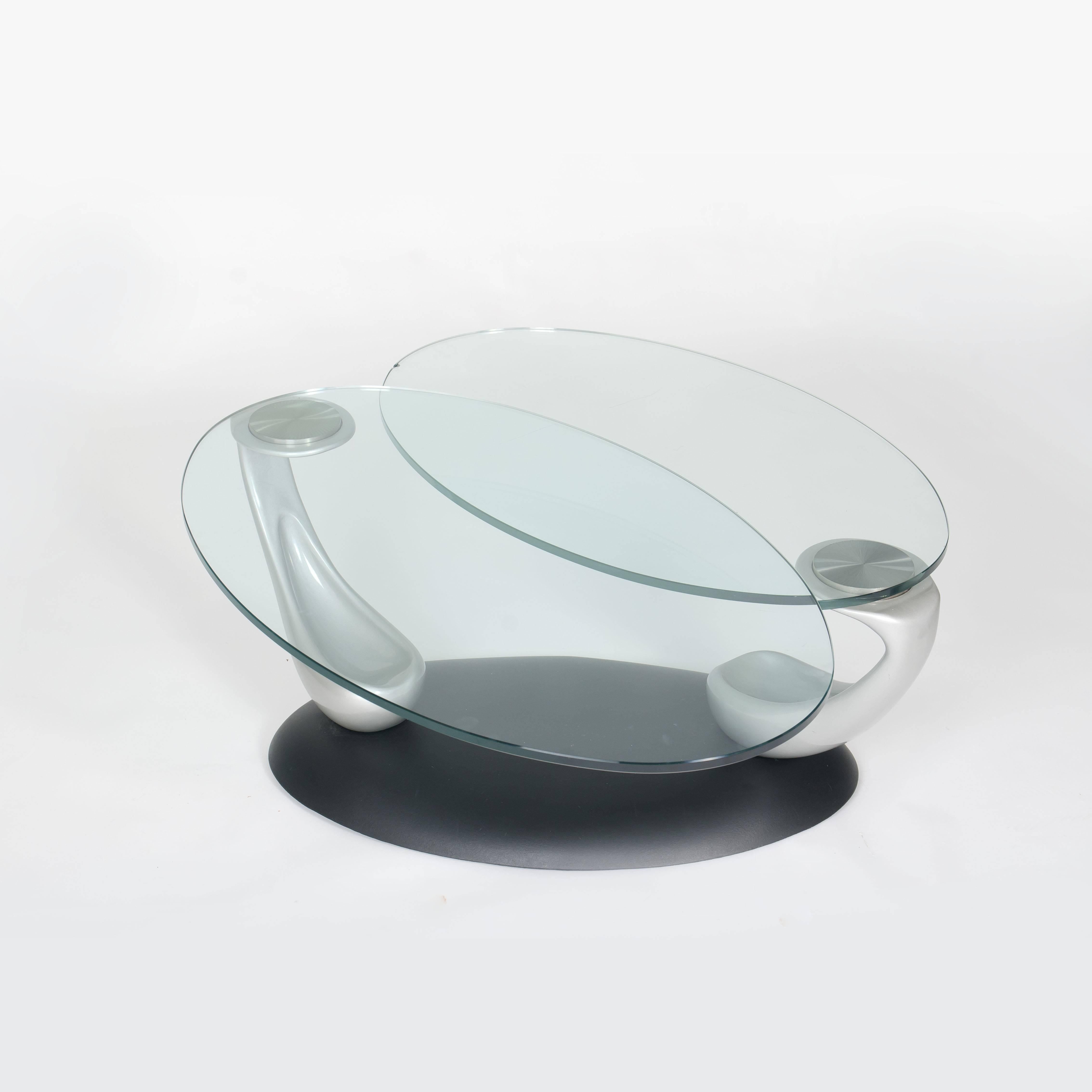 Iconic contemporary NAOS Papillion coffee table by Gamba & Guerra.
Like a beautiful butterfly, this table is designed around an organic structure that exemplifies modern nature.

The sides of the coffee table can be rotated from 360″ closed to 0″