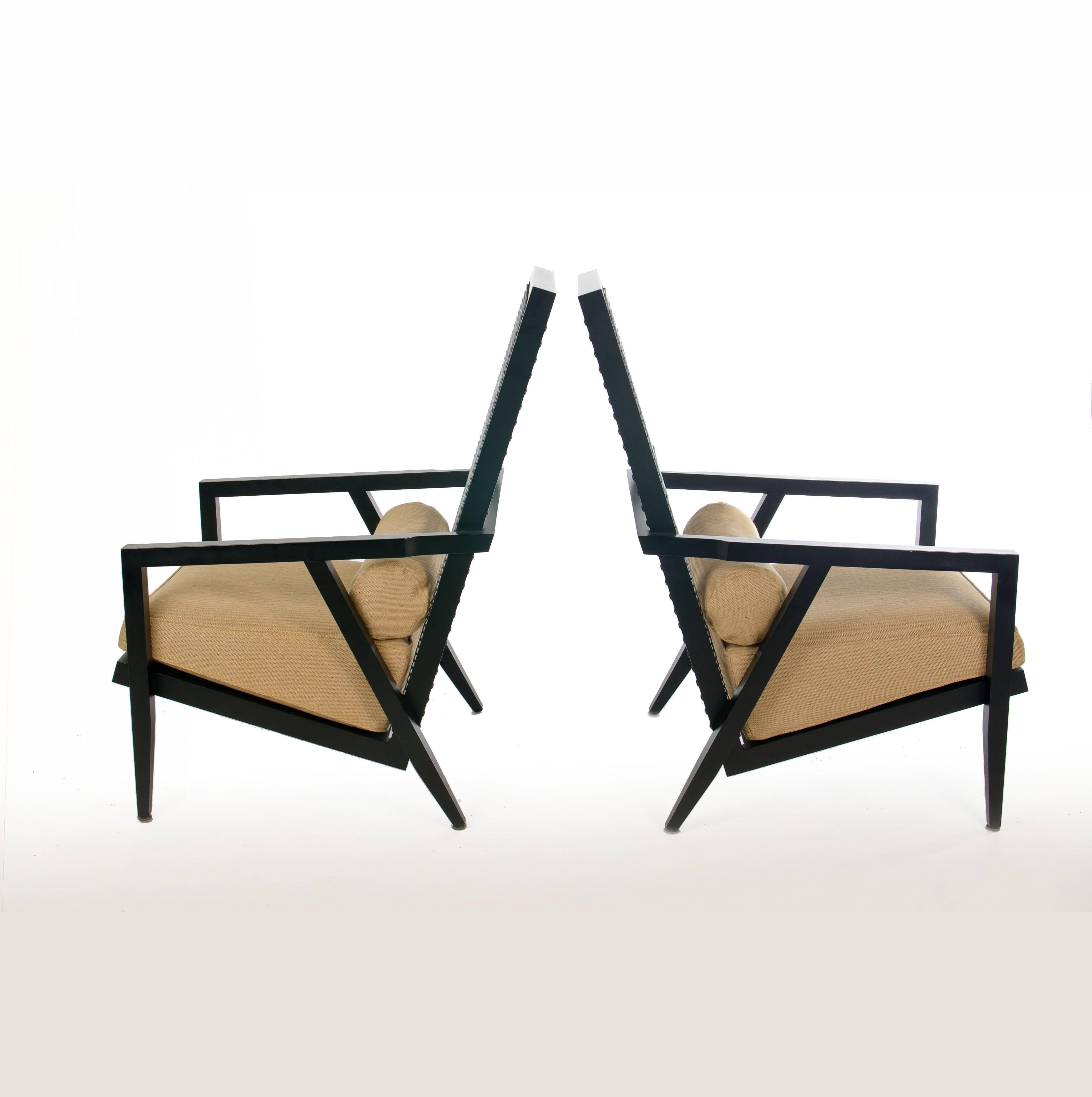 Two labelled Astoria high back lounge chair designed by Franco Bizzozzero manufactured by Pierantonio Bonacina, Italy, 2000s. Stained wood, leather cord. Leather; Metal label.

Pierantonio Bonacina is very representative of his work and his love