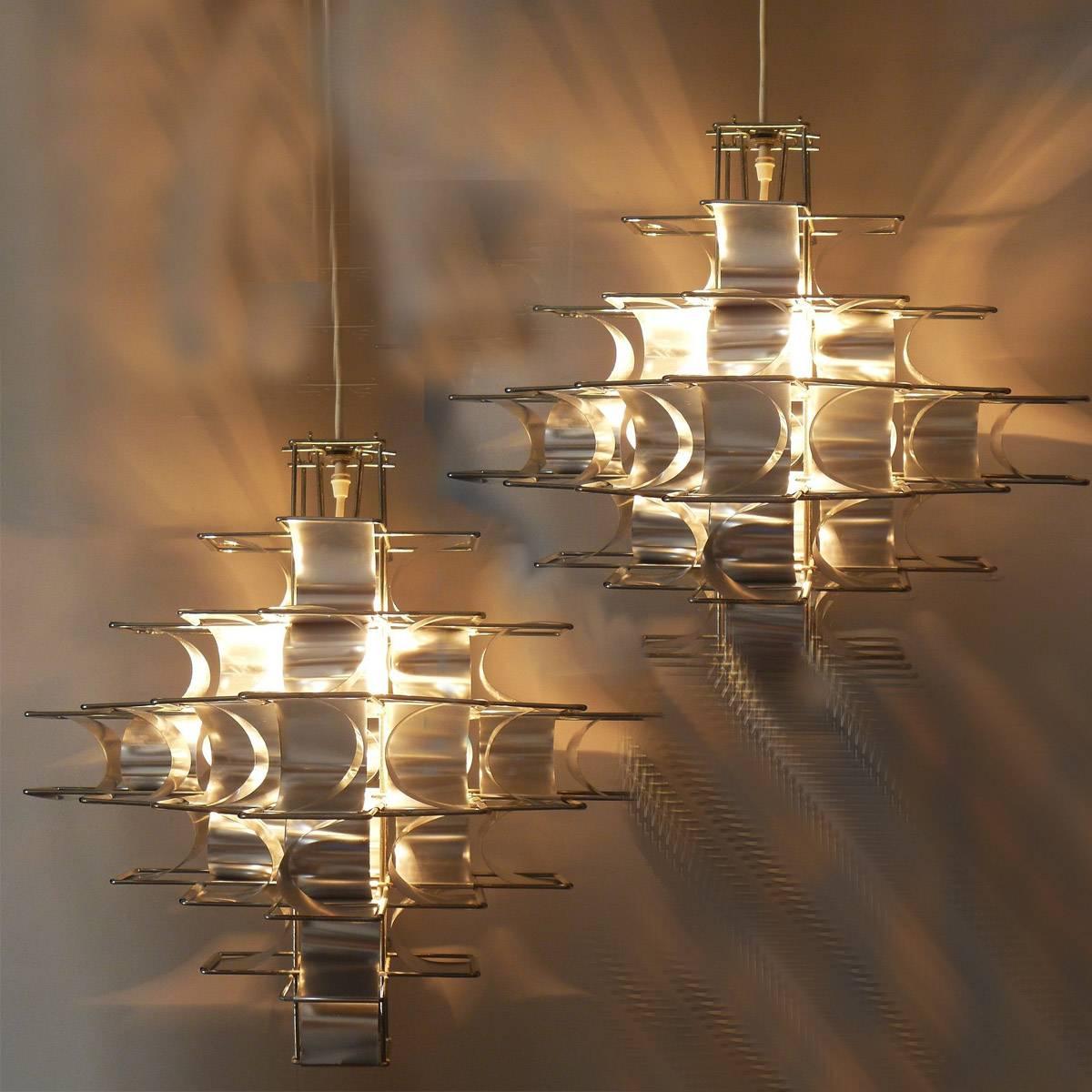 Two wonderful ceiling lamps, designed by Max Sauze for the Max Sauze Studio in 1970. This lamps are is the biggest of the two cassiopee lamps.

We also have a matching Max Sauze table lamp. Ask for availibility. 
 
The lamps are handmade of a