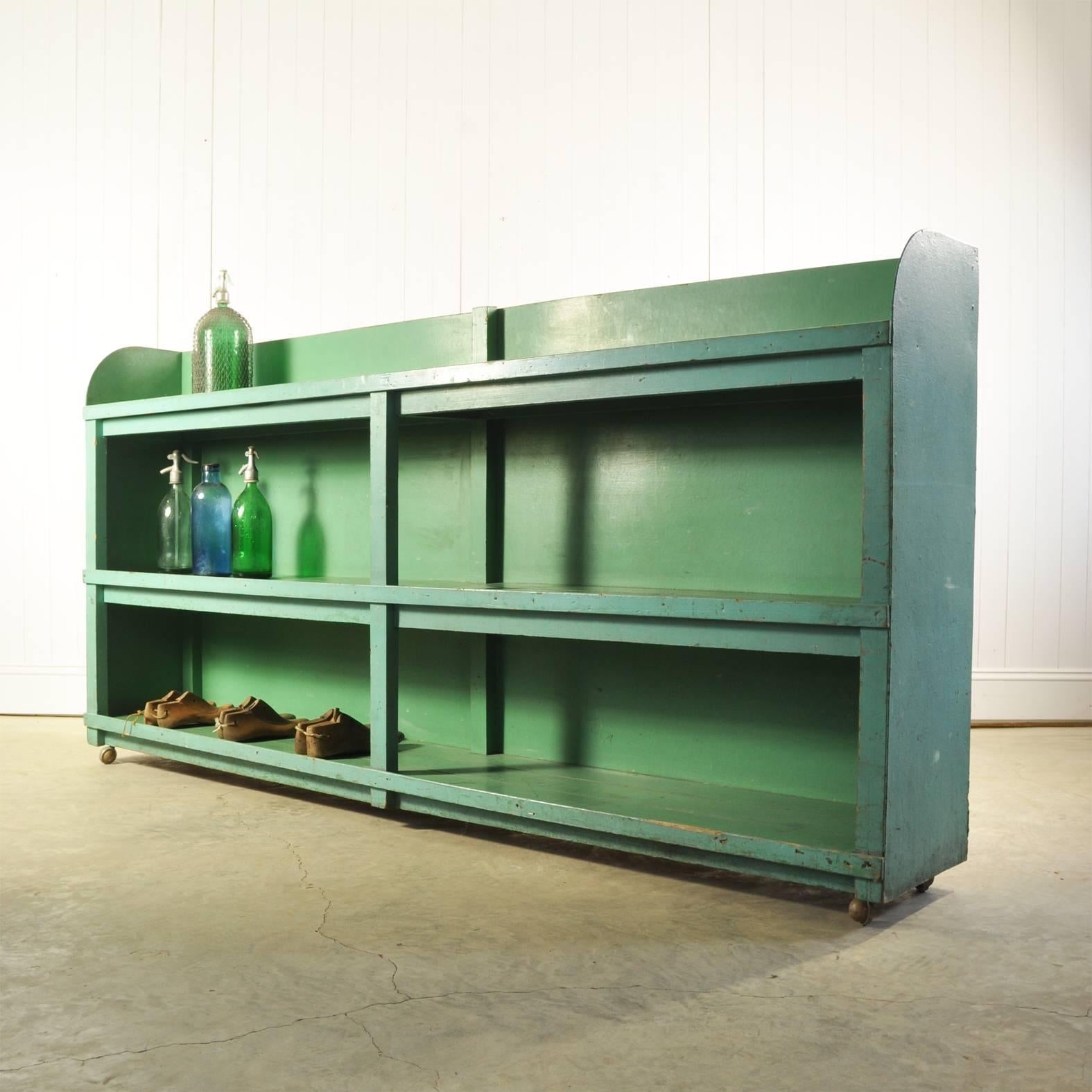 This shelving unit was sourced from a factory in the Czech Republic, circa 1950s-1960s.

Completely authentic with some marks, bumps and scrapes to the original paint.

Original castors, which are ok but not brilliant.

Extremely