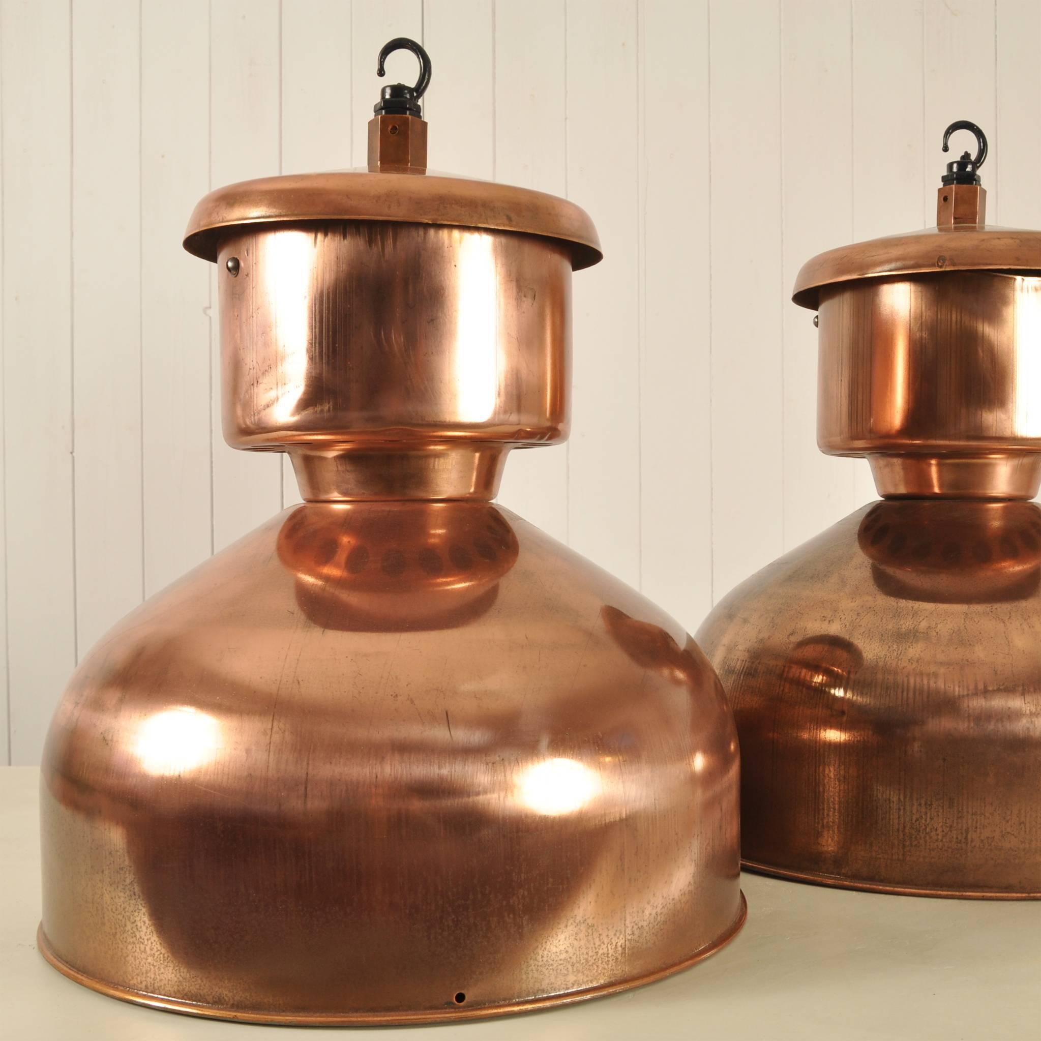 A new idea for us. We have taken some midcentury vintage enamel industrial lights and had them sand blasted and then copper-plated. 

We are really pleased with the results and will be shortly installing some of these into a project at