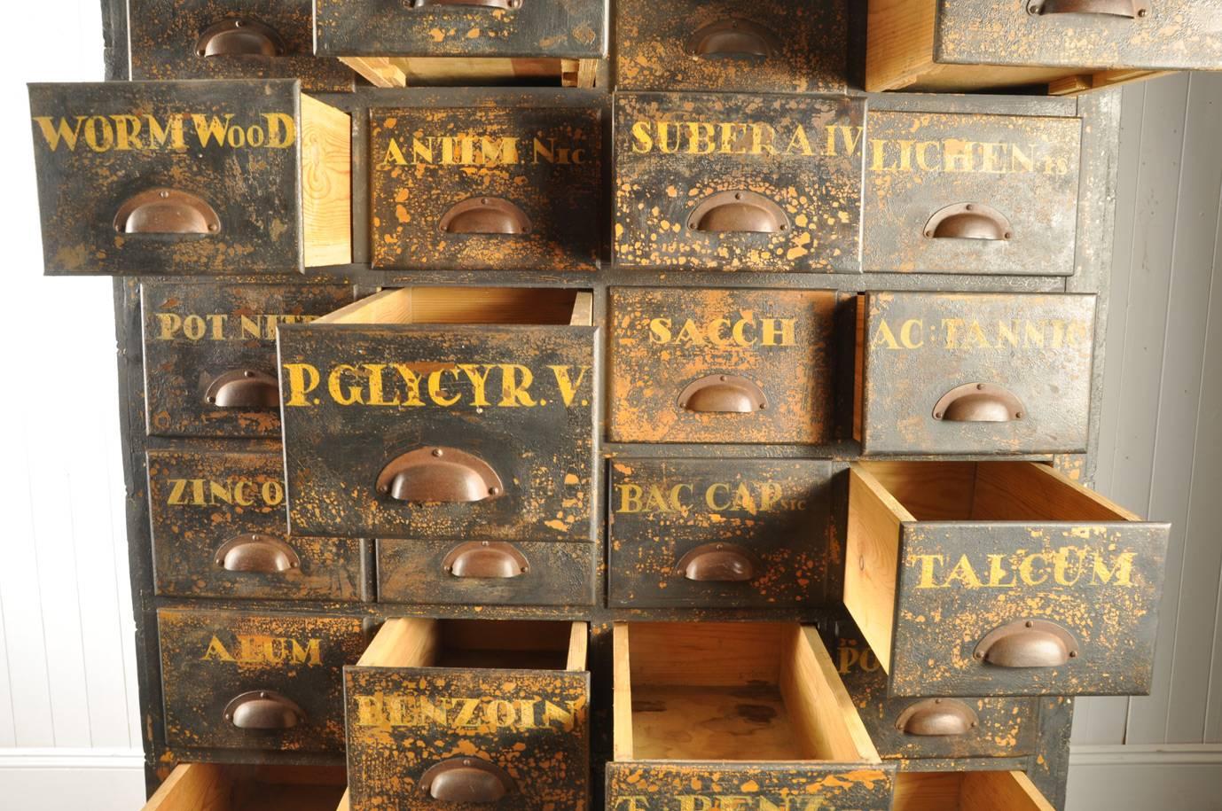 Antique Bank of Apothecary Drawers 1