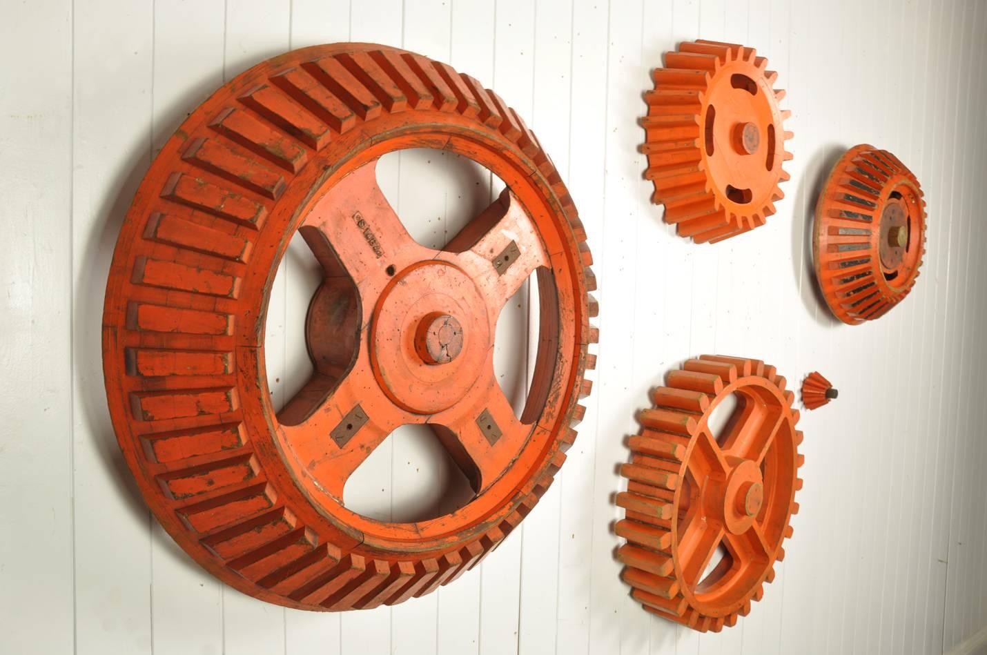 These vintage Industrial patterns we sourced from a steel works in Scotland,   

circa 1930s these were used to make moulds to sand cast steel into cogs.

Mounted on a wall they make a real impact and can be positioned to fill