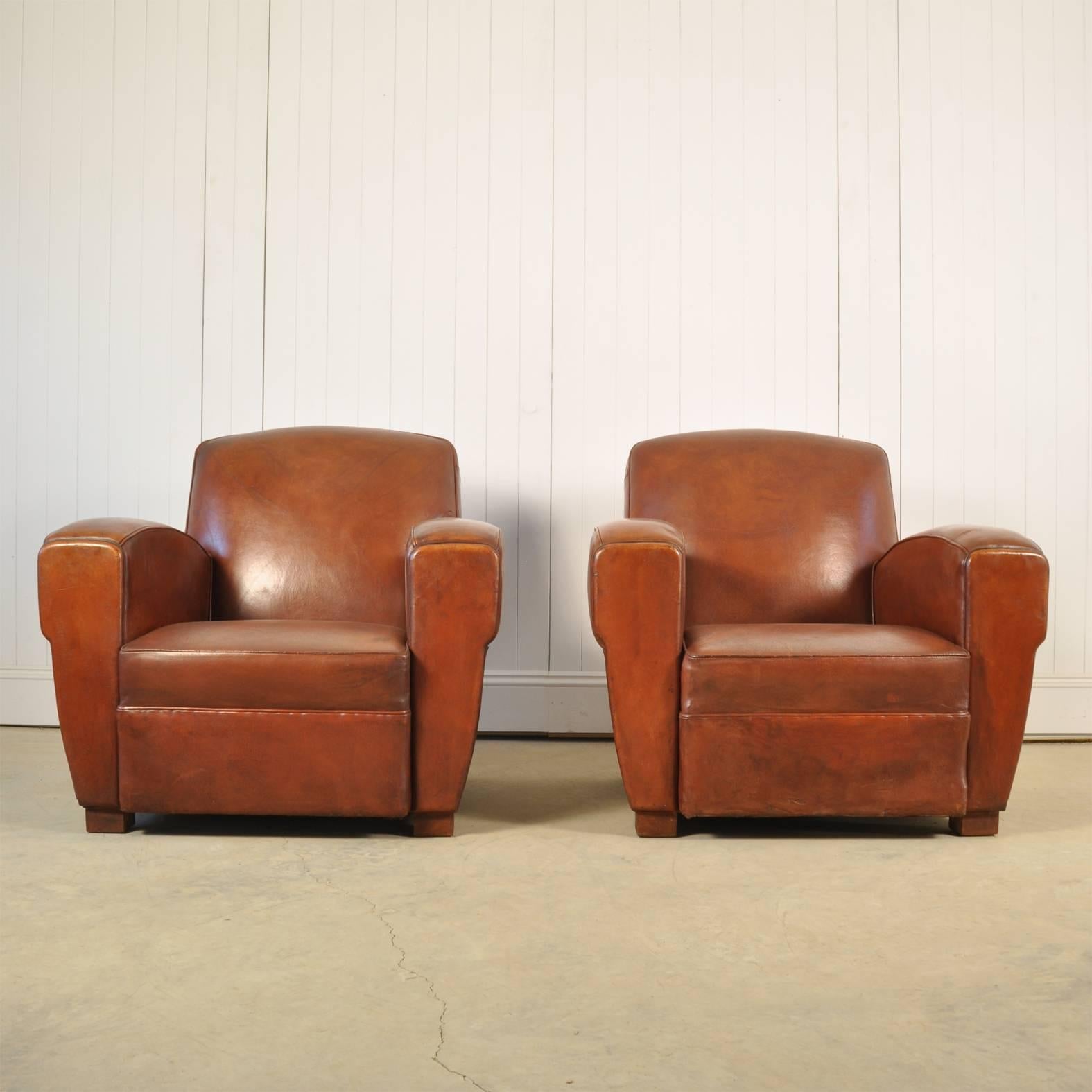 Sourced on a recent trip to the South of France, these vintage leather armchairs are the best we have found in the last 10 years. 

Classic 1940s shape with the sweeping arms.

Apart from being re-sprung these are in completely original