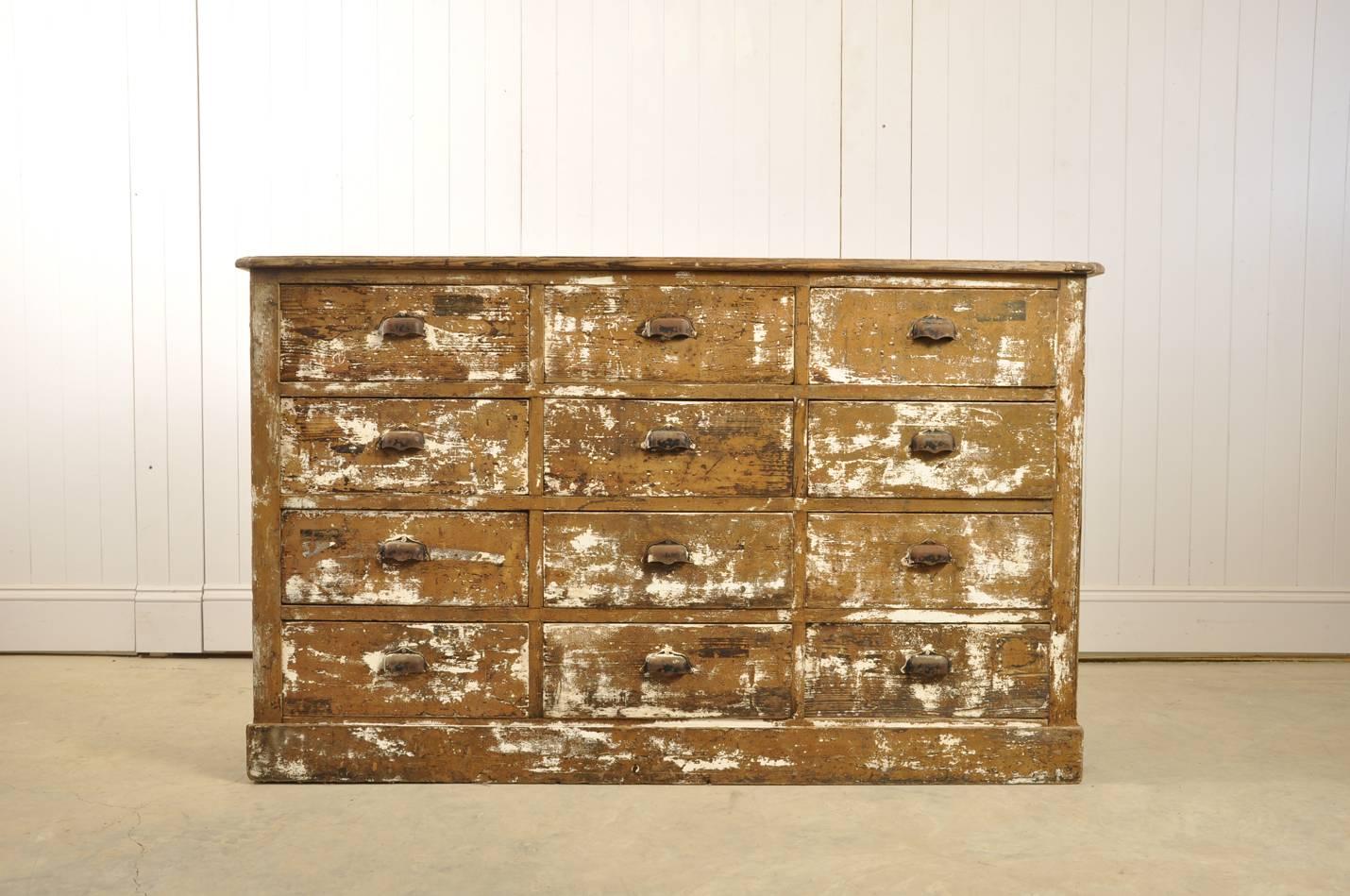 We sourced this vintage chest of drawers in Belgium.  We just loved the look of it, which has been produced by scraping back the layers of paint. 

It has quite a rustic / Industrial feel to it with a few splashes of paint here and there.

Some