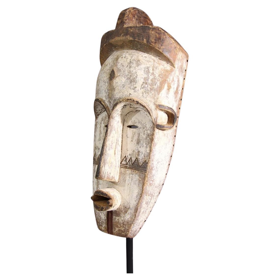 Very expressive and modern looking mask (sculptur).
The powdery colors and the reduced shape underline the beauty of the object.


Fang mask of Ngil 
In the category of great African masks, the Fang masks of Gabon, usually coated with kaolin 
(the