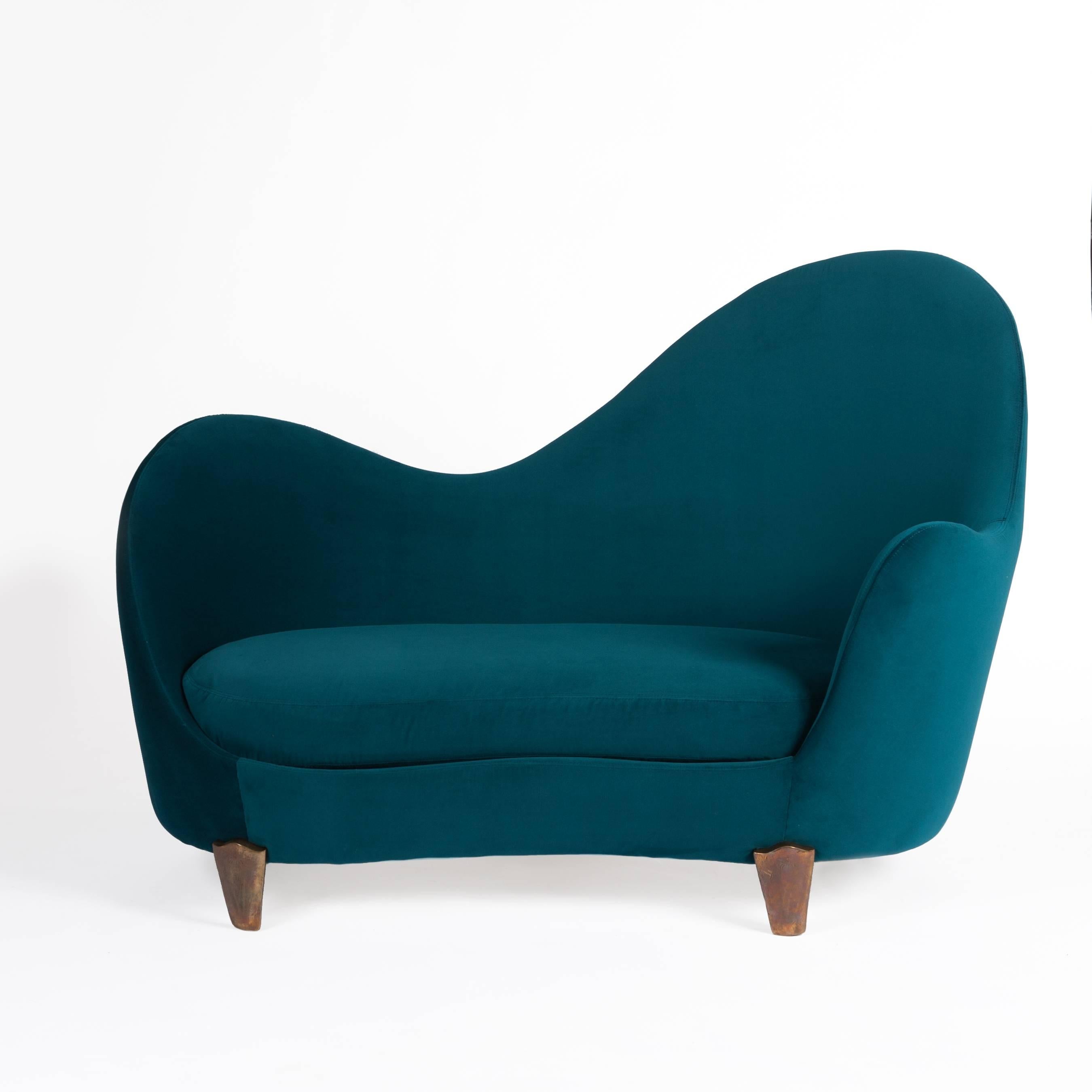 Famous sofa by Garouste & Bonetti with a wavy back and bronze feet
covered with a new turquoise Pierre Frey velvet.
Signature on both feet / inside.