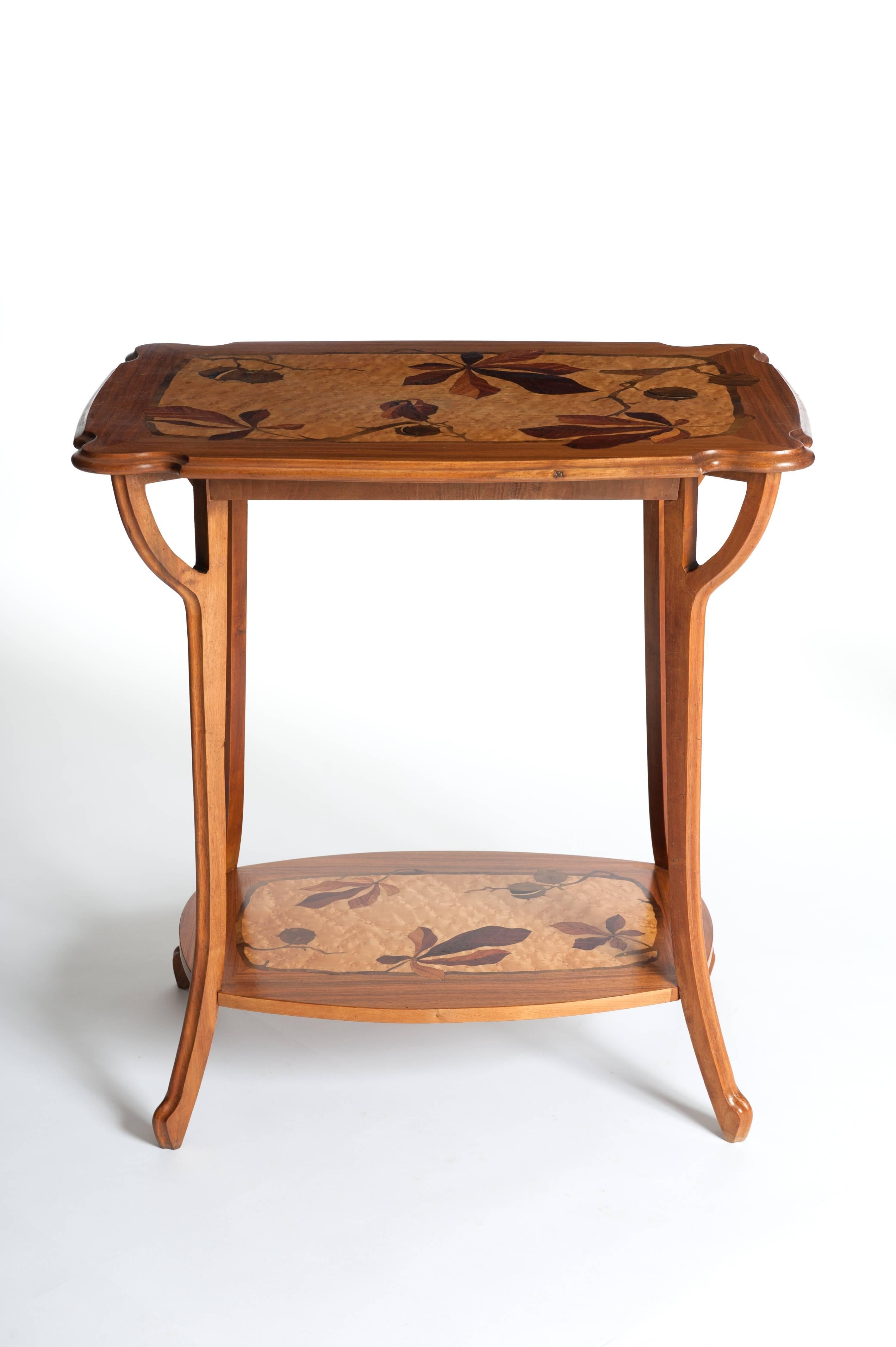 Elegant rosewood gueridon with fine naturalistic inlays of palisander wood,
boxxwood, marple wood, chestnut wood and poplar wood.
The ebenist Edouard Diot (Maison Mercier Frères) used to design
sumptuously Art Nouveau furniture’s in elegant,